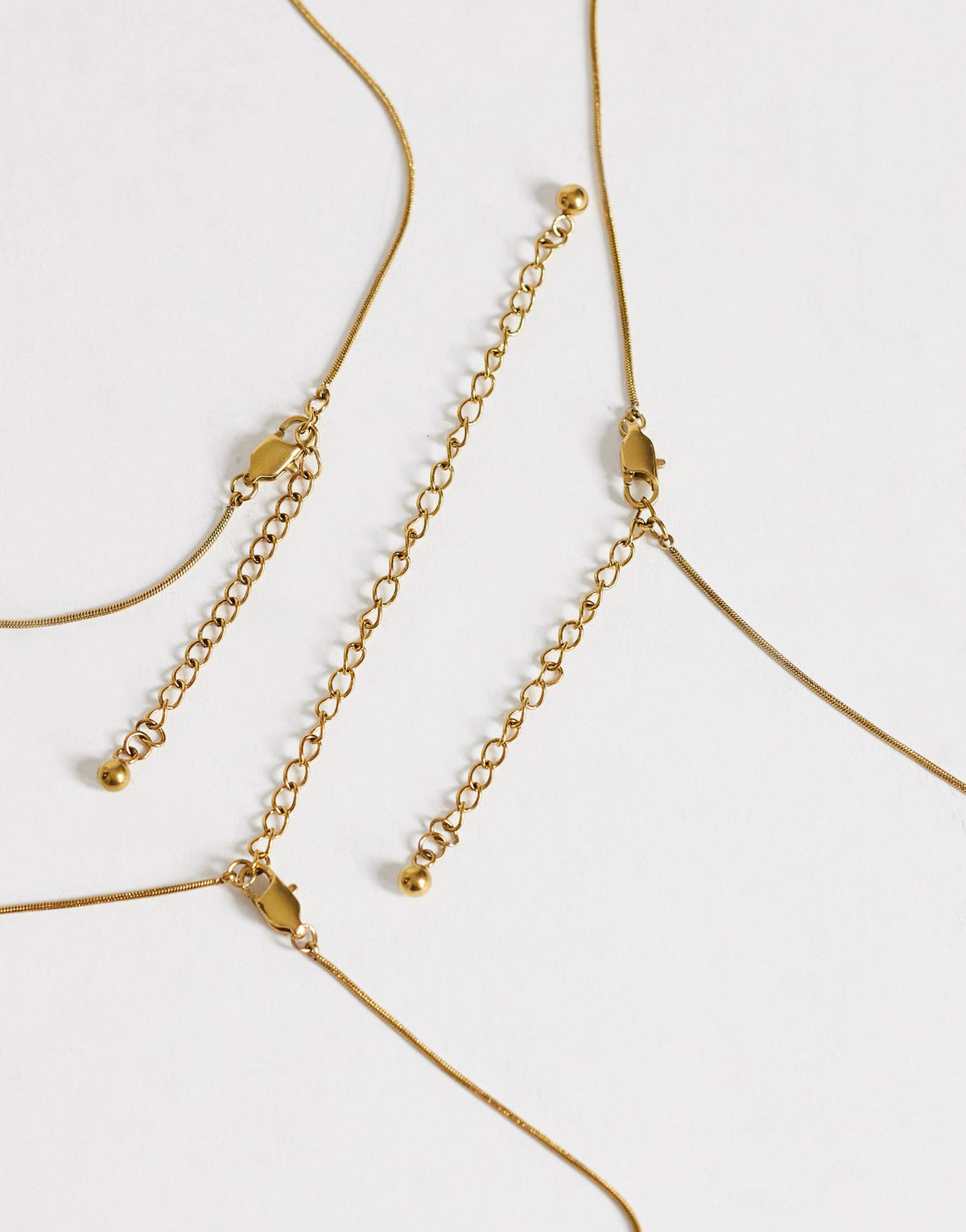 Topshop Lyra waterproof 3 pack necklaces in stainless gold