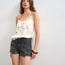 Topshop denim A-line short with rip in washed black