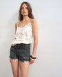 Topshop denim A-line short with rip in washed black