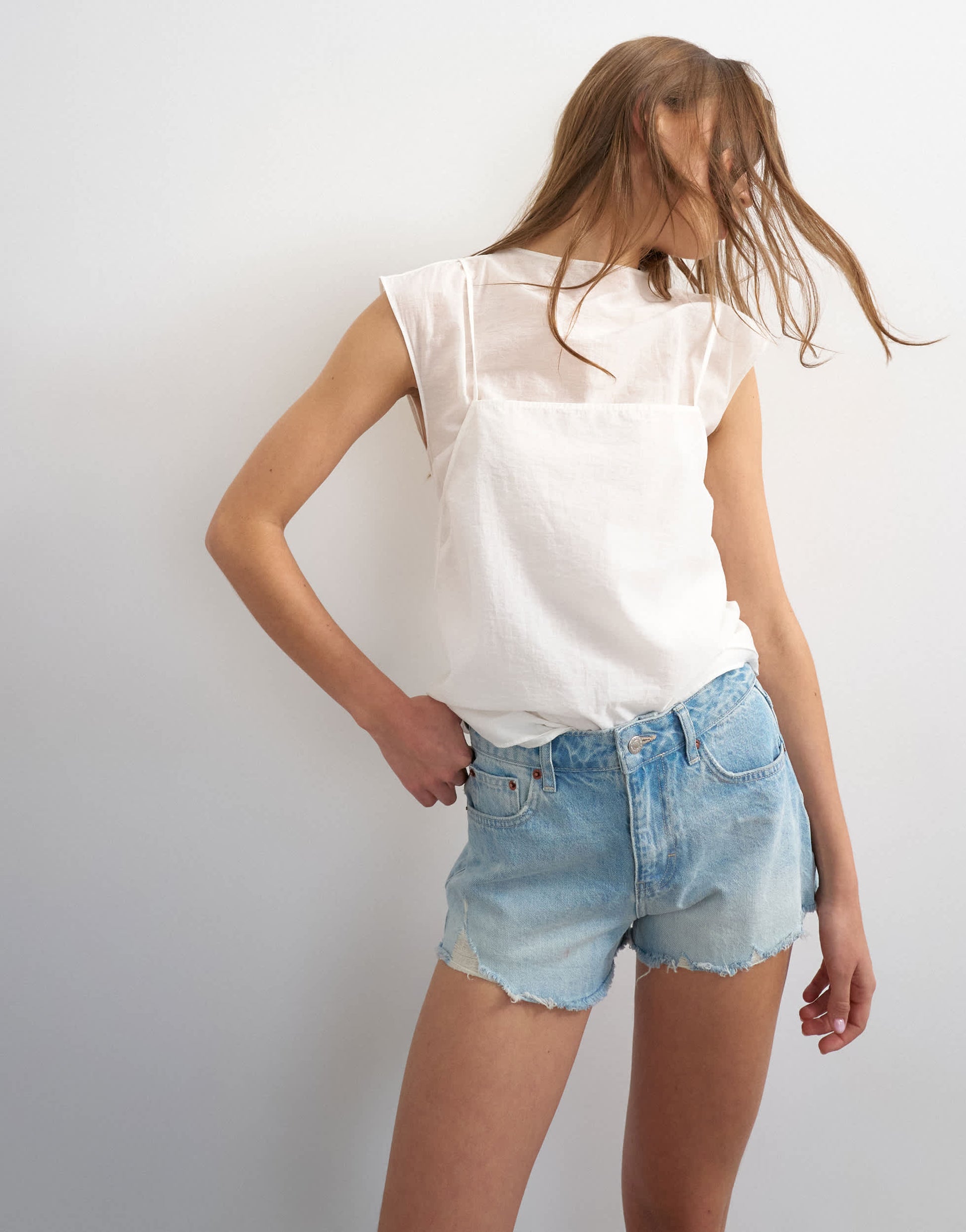 Topshop denim A-line short with rip in bleach