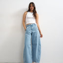 Topshop Horseshoe mid rise barrel jean in bleach stripe