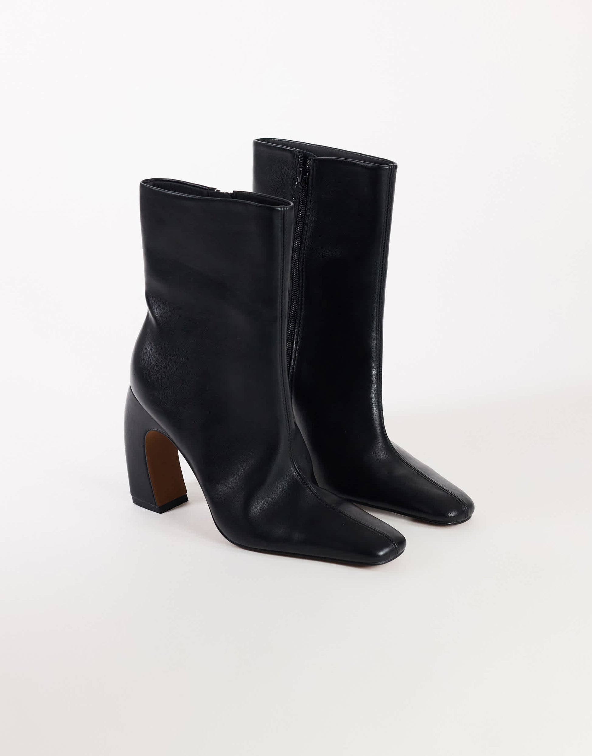 Topshop Karter curved heel ankle boot in black stretch faux leather