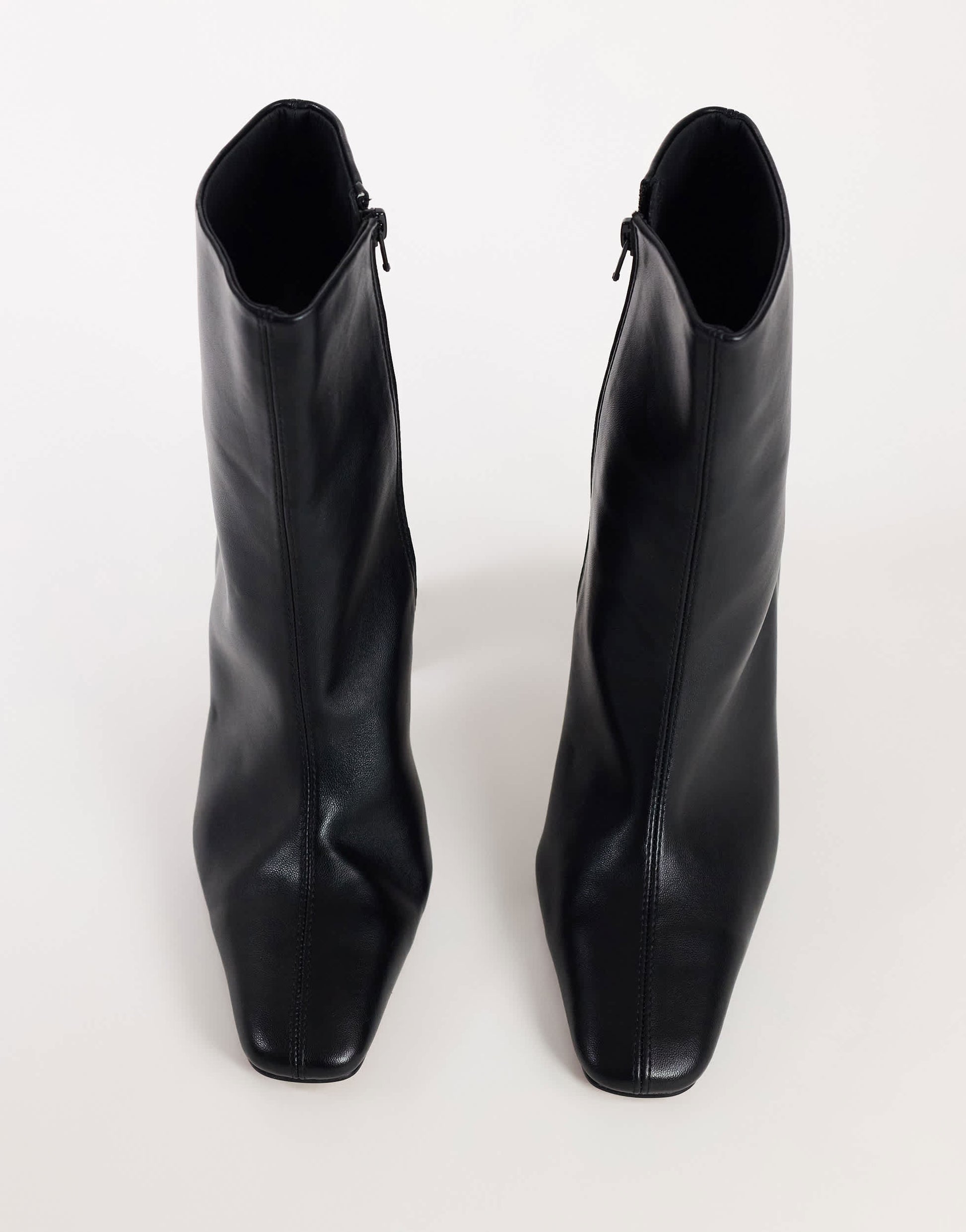 Topshop Karter curved heel ankle boot in black stretch faux leather