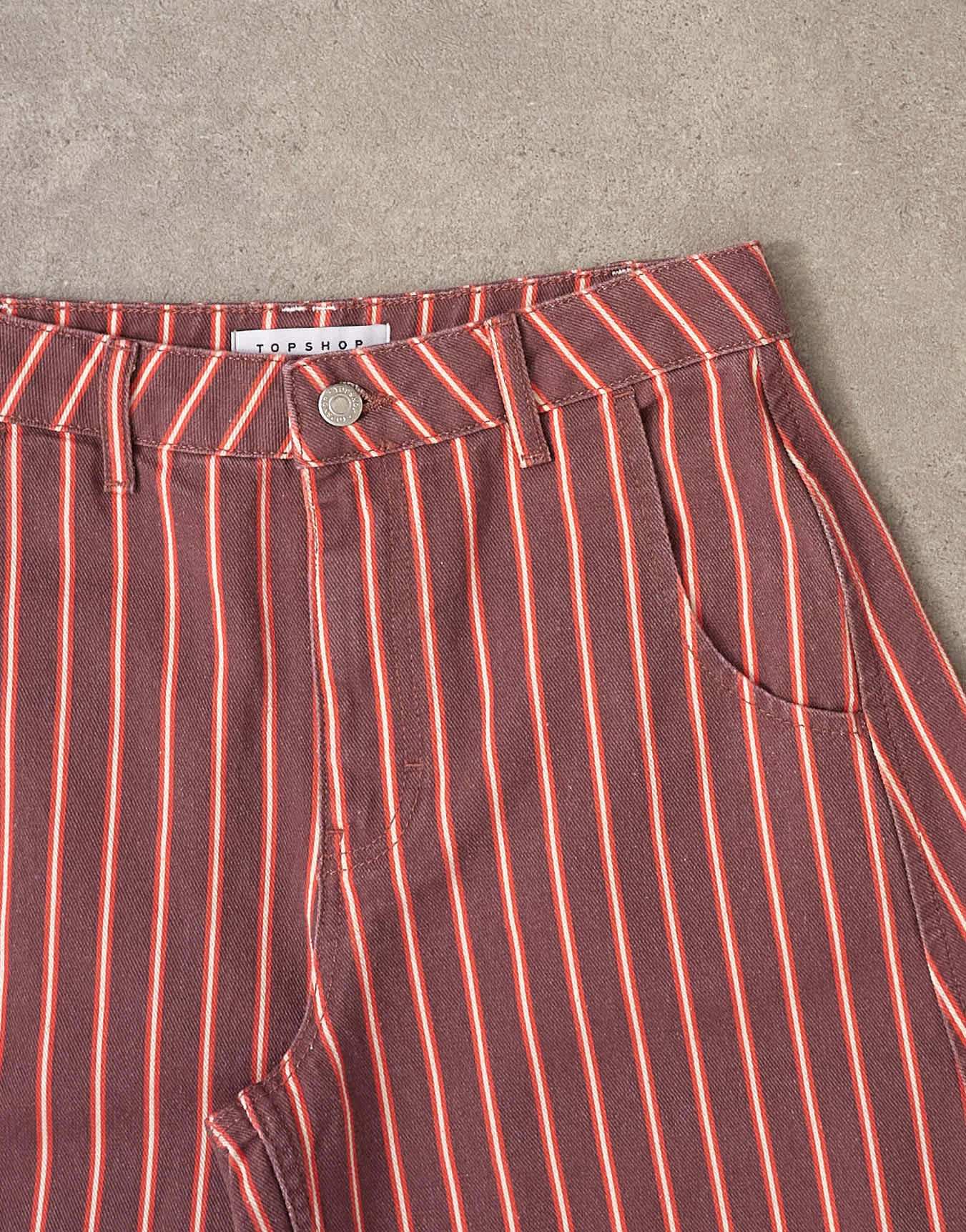 Topshop Horseshoe mid rise jean in pink and red stripe