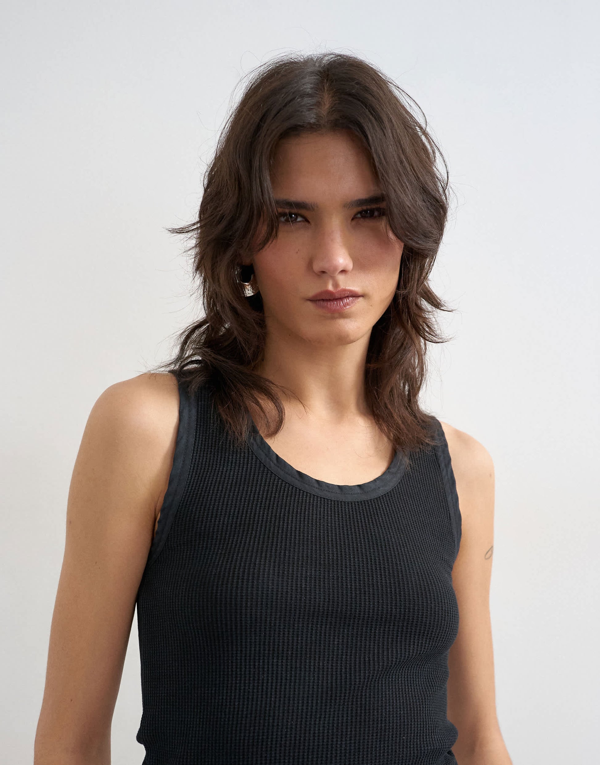 Topshop washed waffle vest with woven trim in washed black