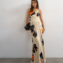 Topshop satin low scoop flood length slip dress in black and orange bold floral