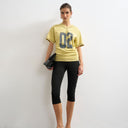 Topshop micro v-neck ruched side graphic tee in yellow