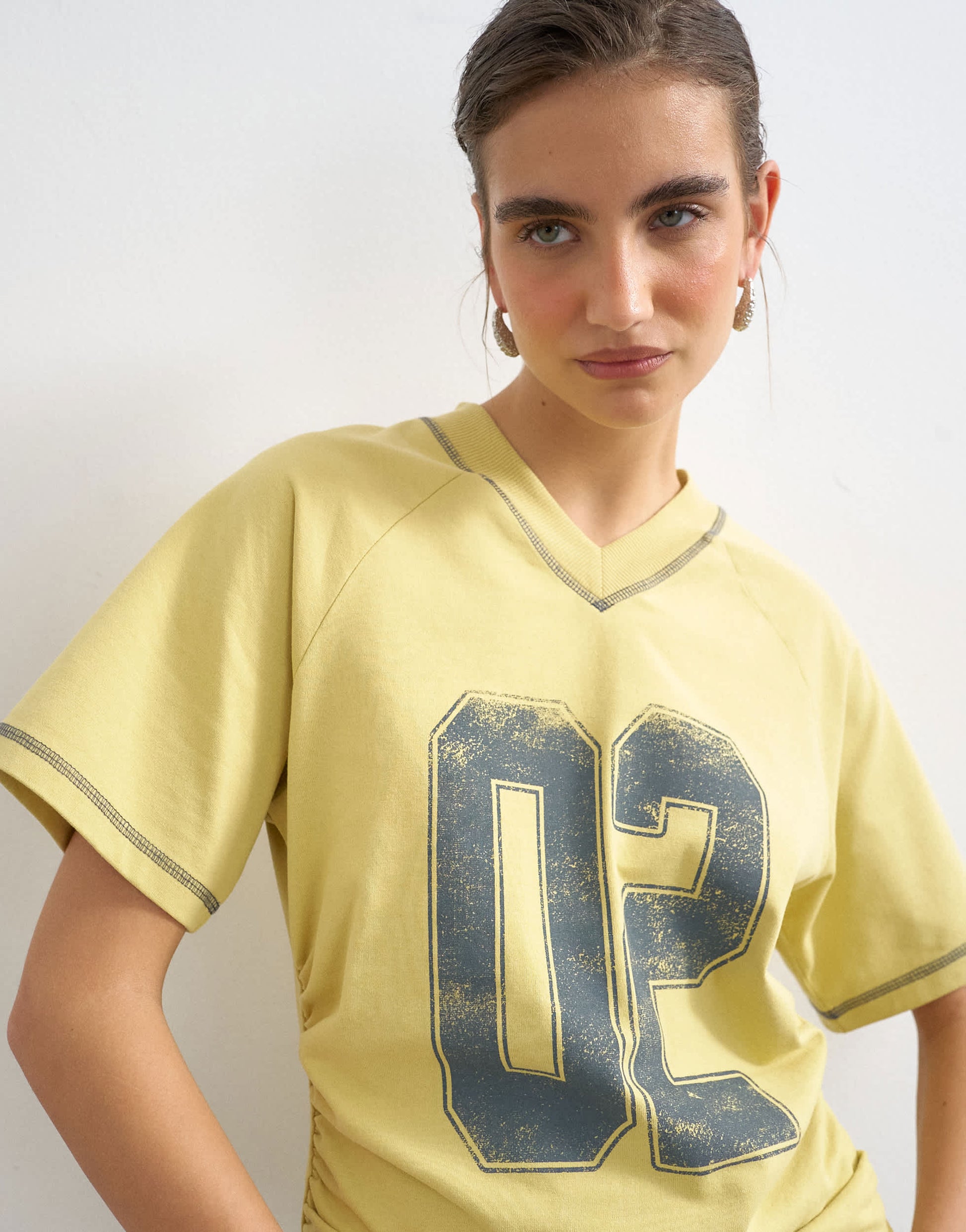 Topshop micro v-neck ruched side graphic tee in yellow