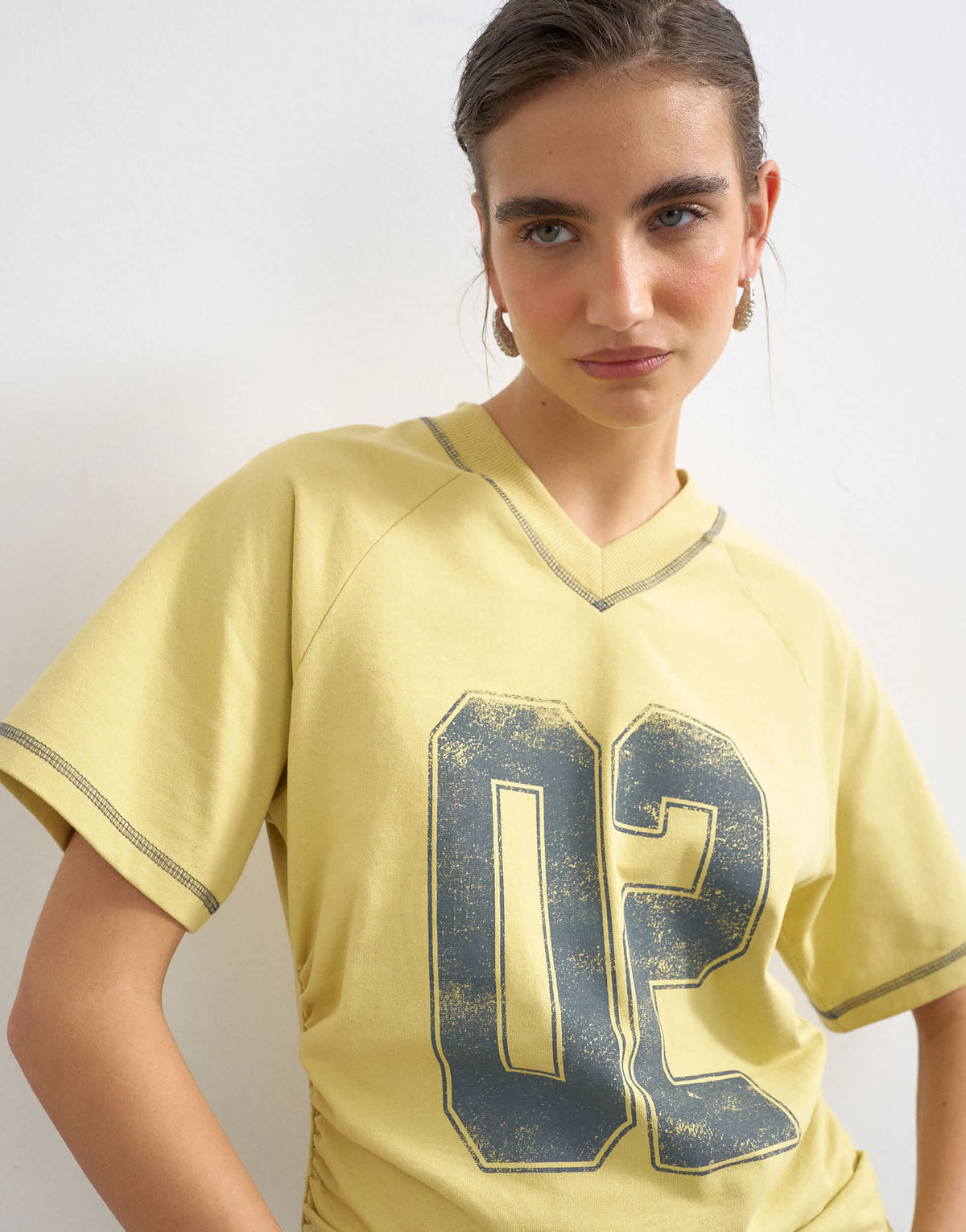 Topshop micro v-neck ruched side graphic tee in yellow