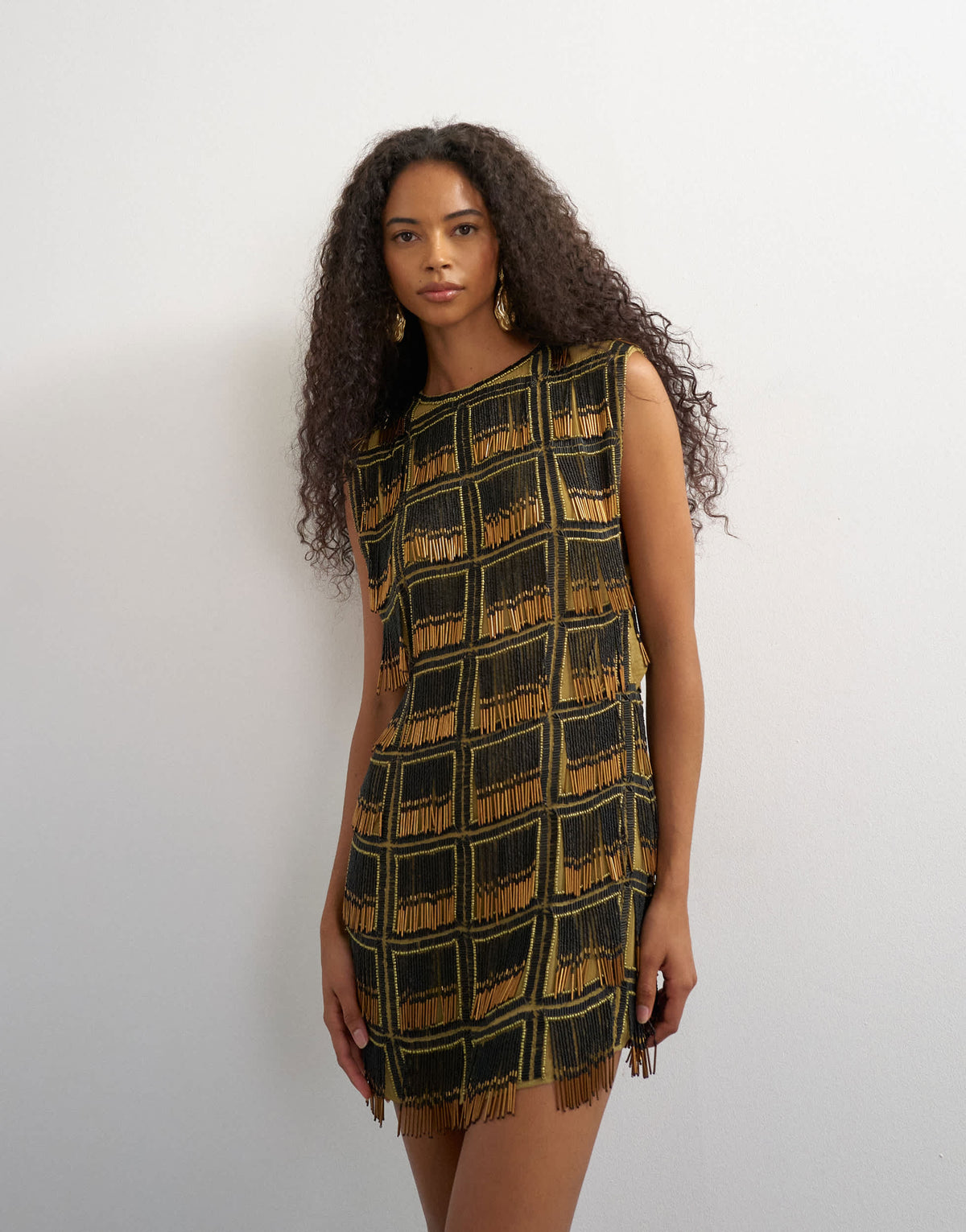 Topshop premium heavily embellished open back mini dress in black and gold
