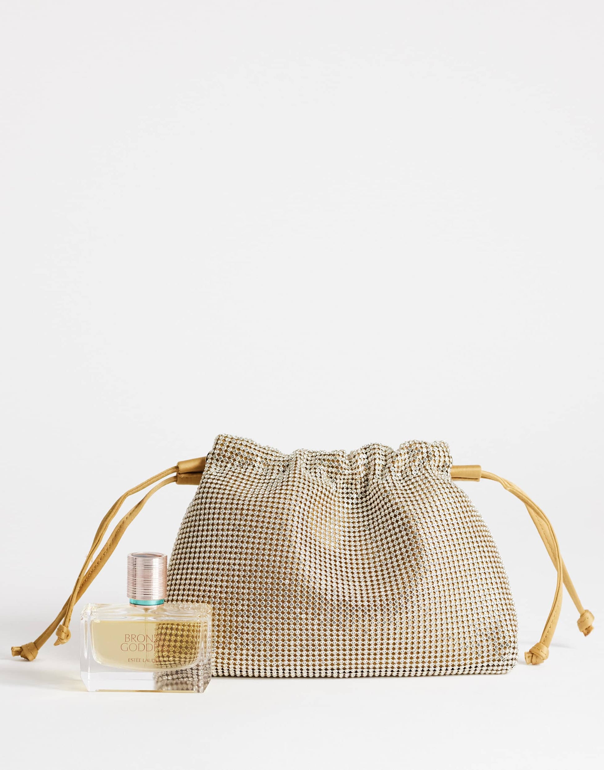 Topshop Seleena small diamante drawstring clutch bag in gold