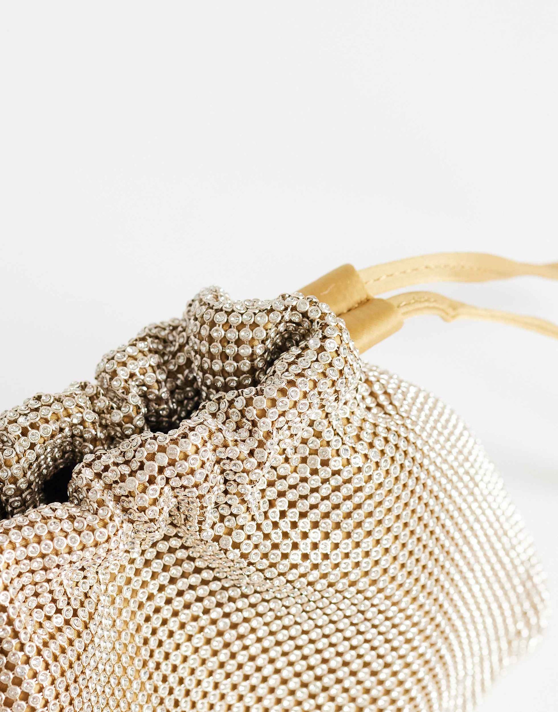 Topshop Seleena small diamante drawstring clutch bag in gold