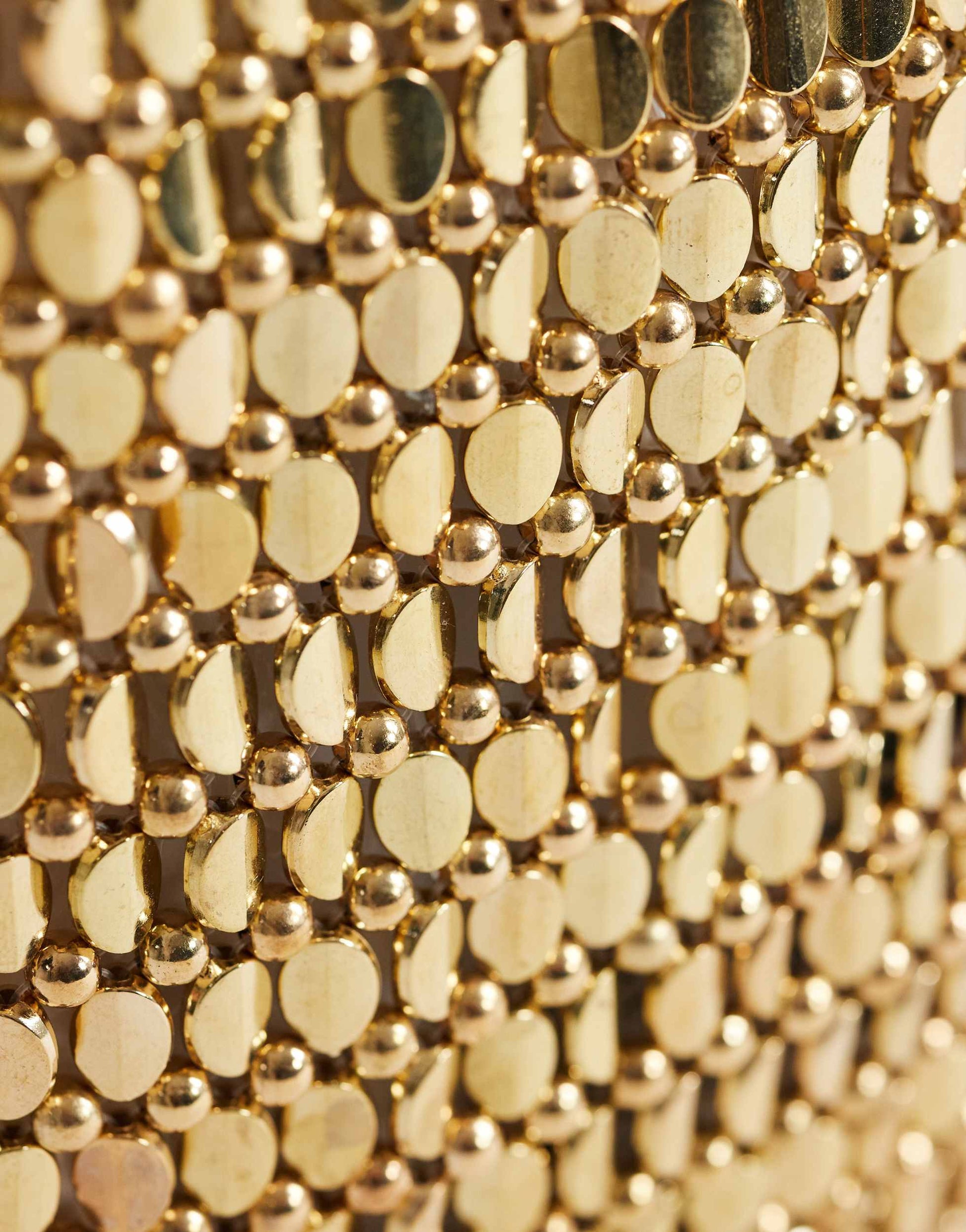 Topshop Junoe small beaded wristlet grab bag in gold