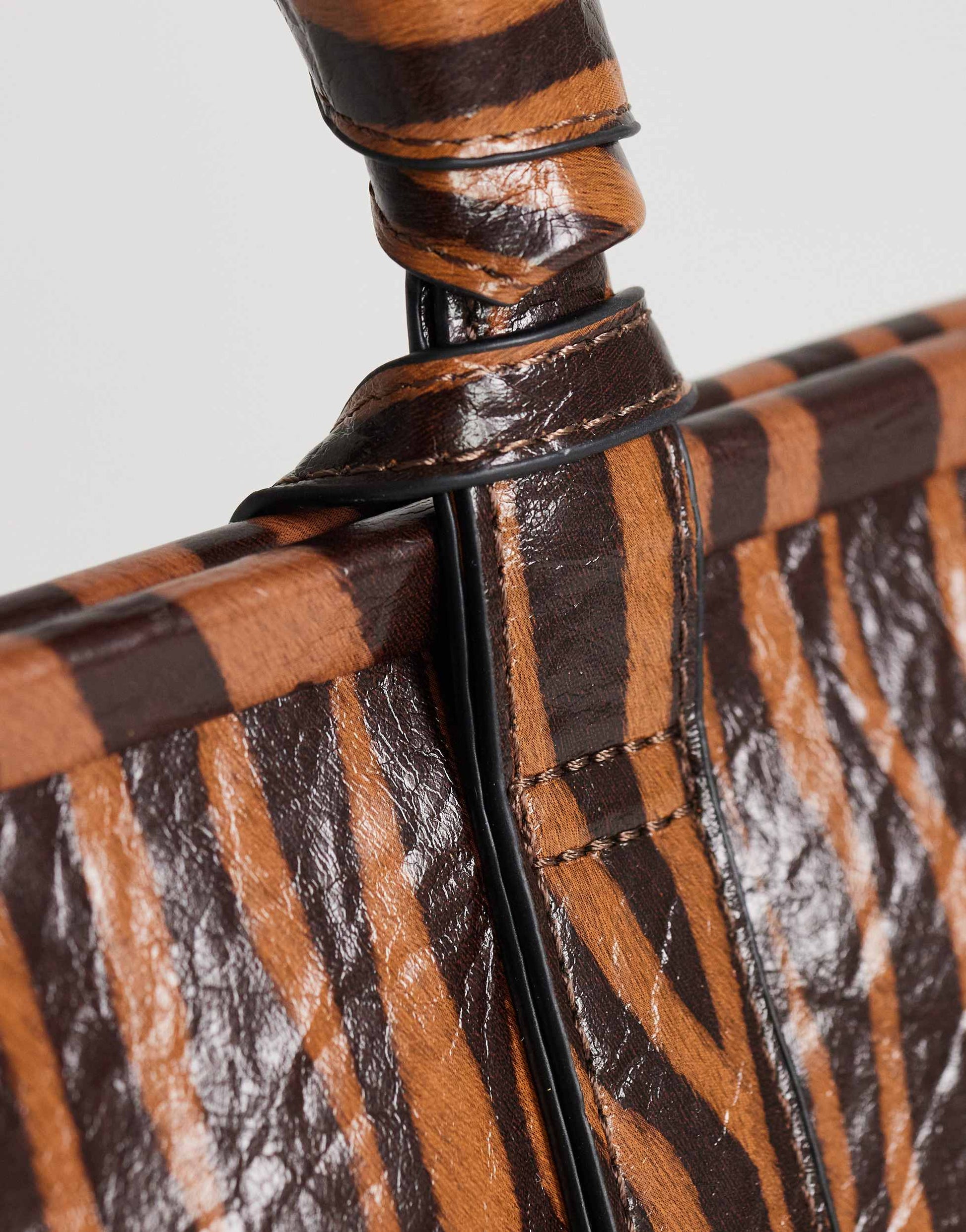 Topshop Jade mini wristlet grab bag in tiger print