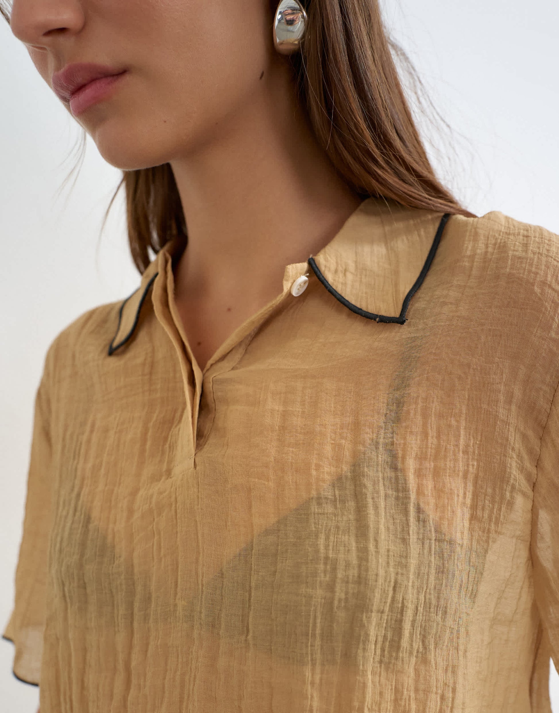 Topshop crinkle polo shirt with black tipping in mocha