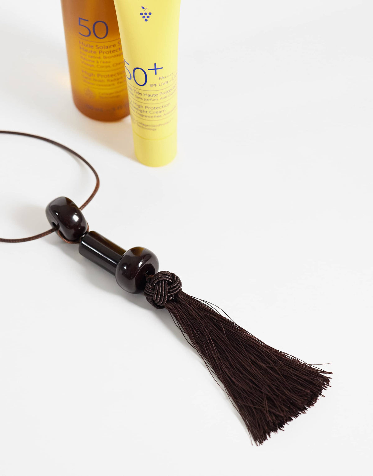 Topshop Magnus cord necklace with beads and tassel in chocolate