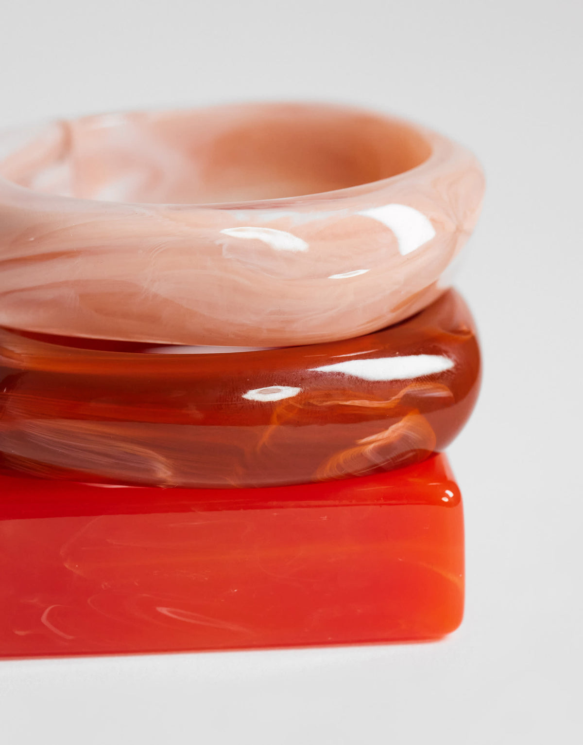 Topshop Flo 3 pack resin bangles in red, burnt orange and pink