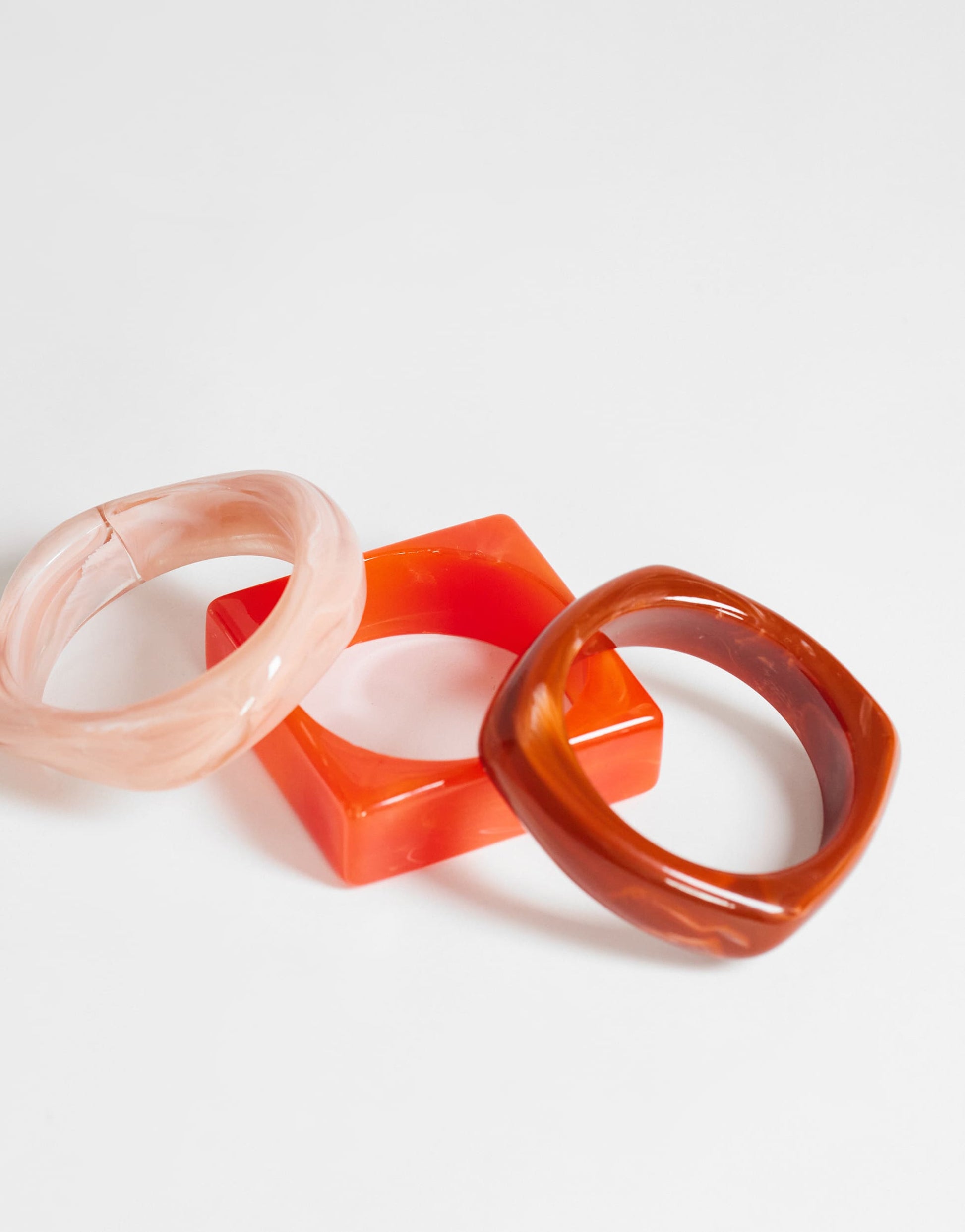 Topshop Flo 3 pack resin bangles in red, burnt orange and pink