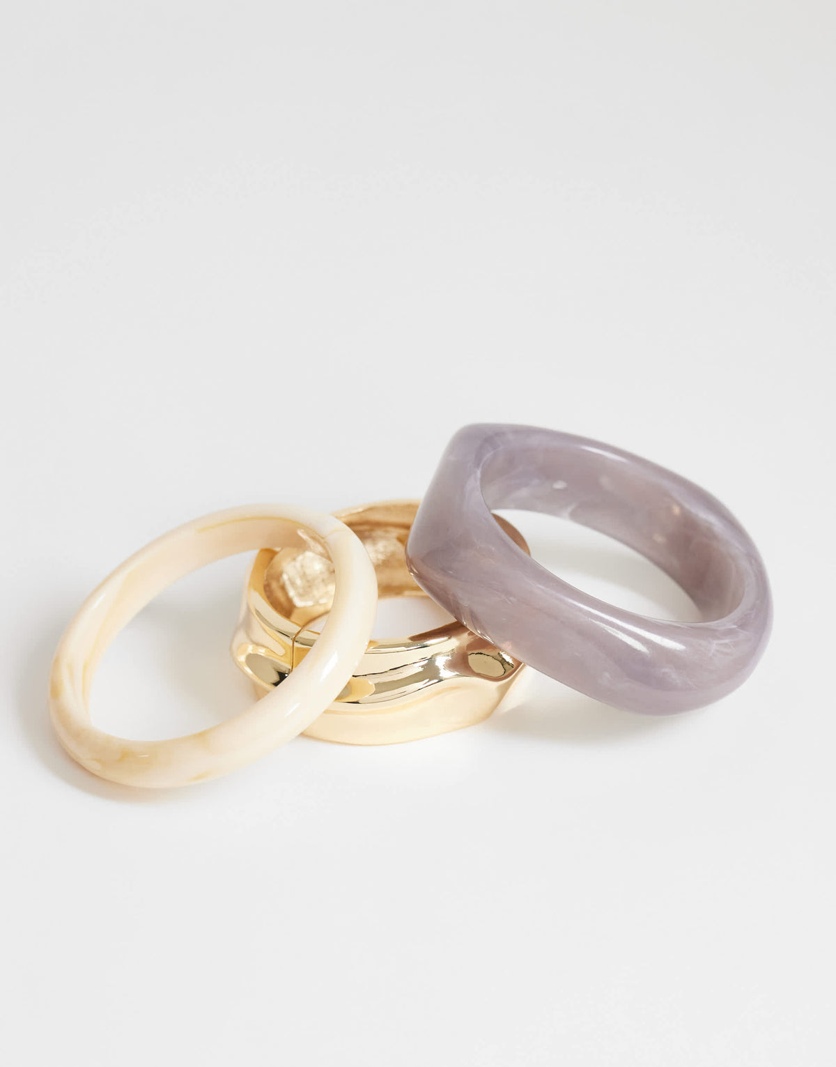 Topshop Flower 3 pack resin bangles in neutral and gold mix