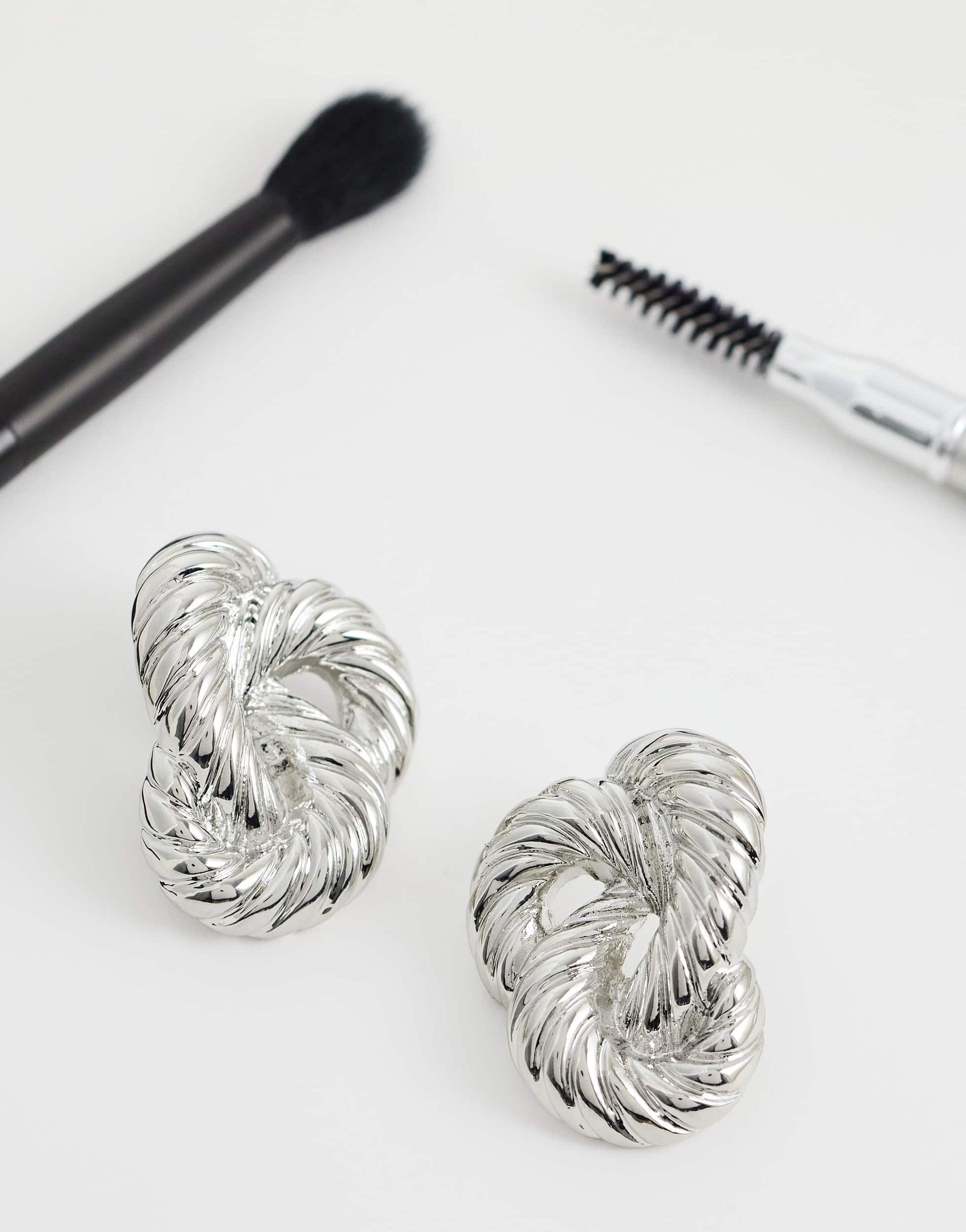 Topshop Dean asymmetric hoop earring in silver