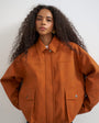 Topshop faux leather oversized bomber jacket in burnt umber