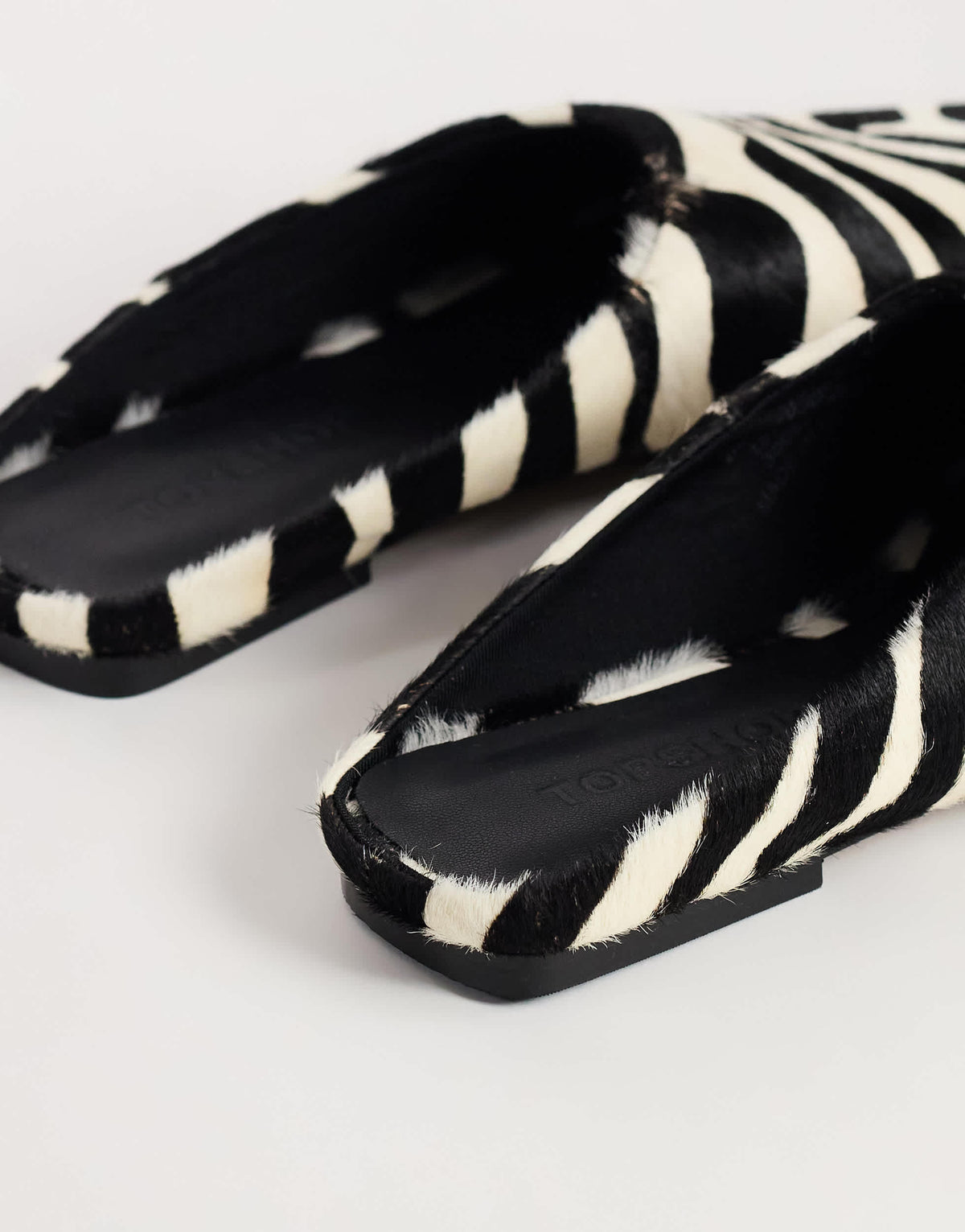 Topshop Dawn flat pointed shoe in zebra print hair on real leather