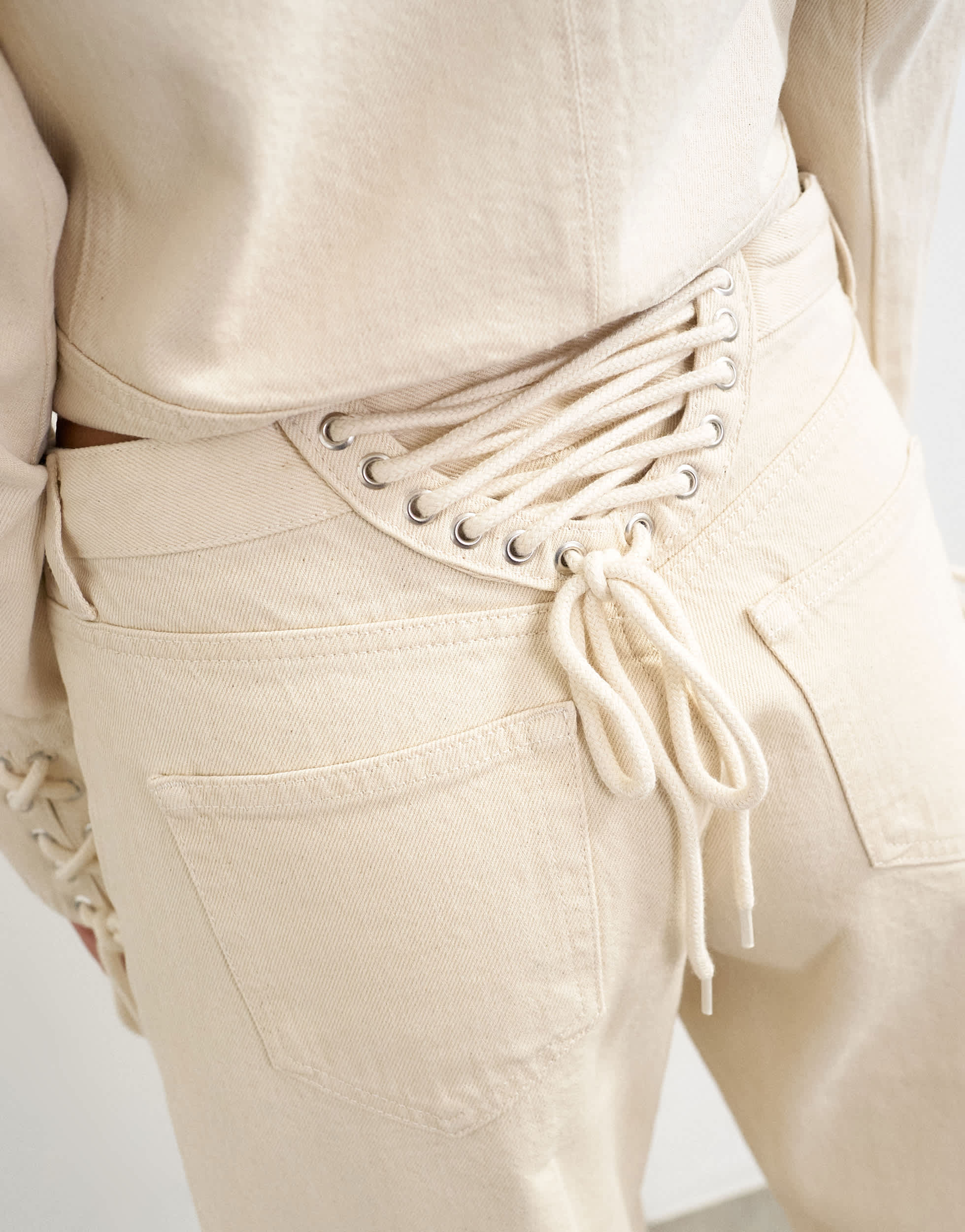 Topshop Ember low rise relaxed straight leg jean with lace up detail in oat