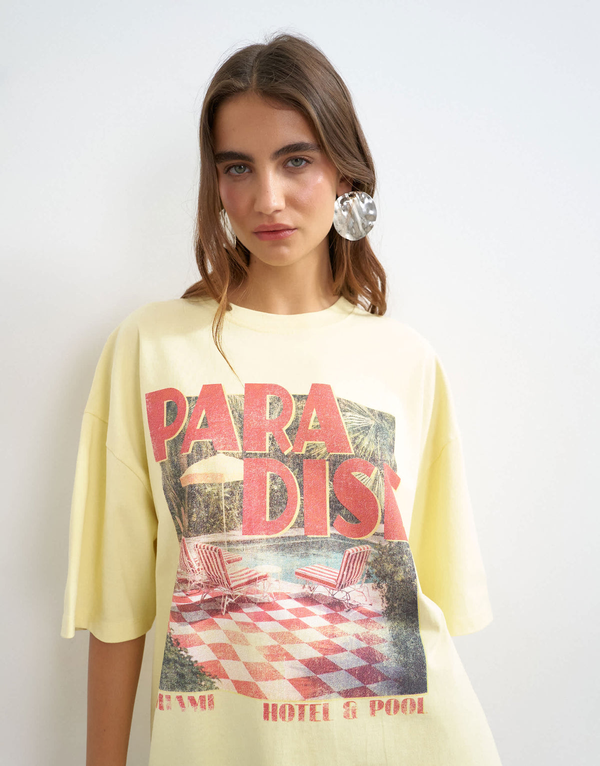 Topshop graphic 'Paradise' short sleeved t shirt in yellow