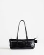 Topshop Snoopy small zip front pocket shoulder bag in black