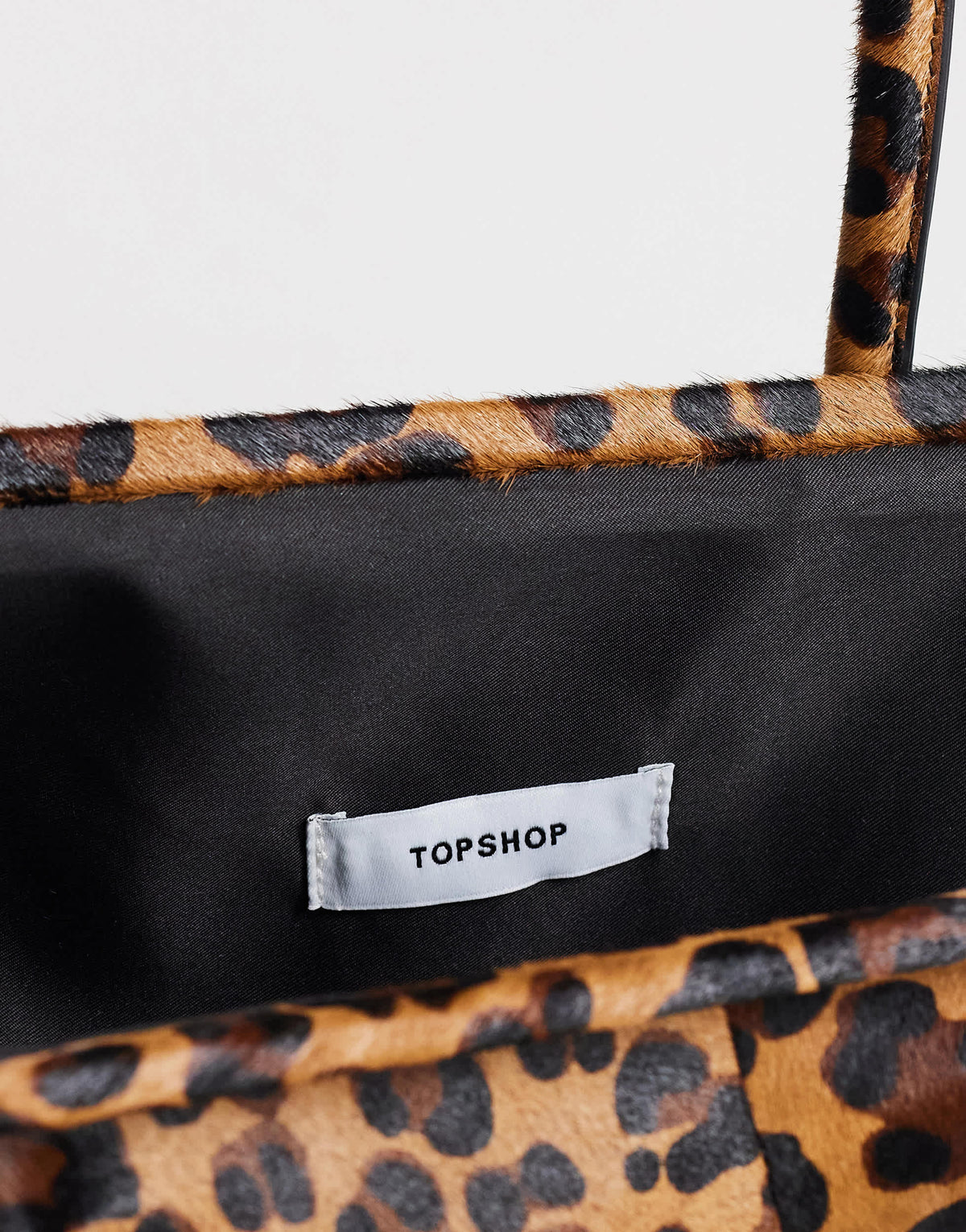 Topshop Sophie medium hair on real leather angular shoulder bag in leopard print
