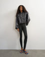 Topshop faux leather oversized zip up bomber jacket in washed black