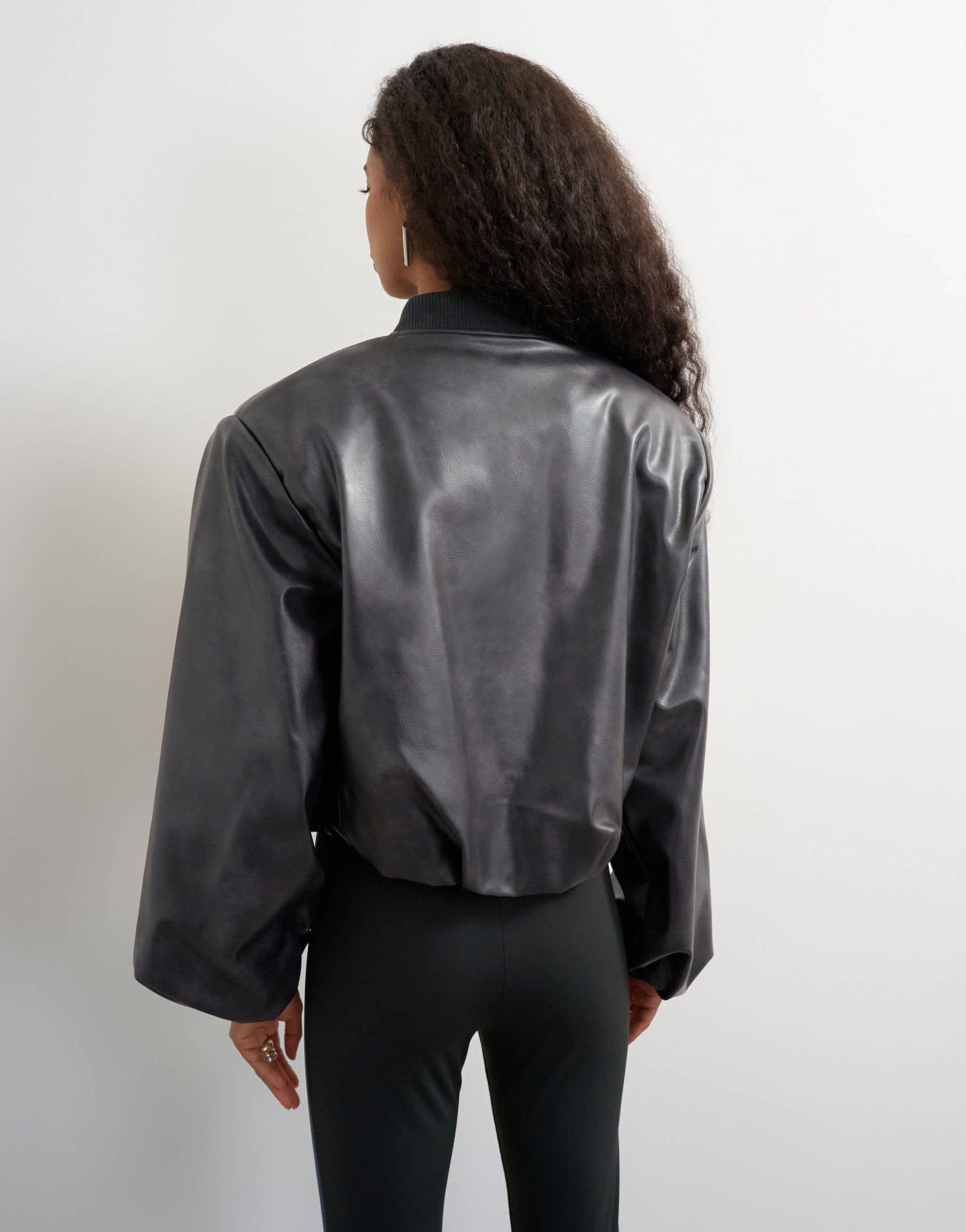 Topshop faux leather oversized zip up bomber jacket in washed black
