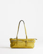 Topshop Snoopy small zip front pocket shoulder bag in chartreuse