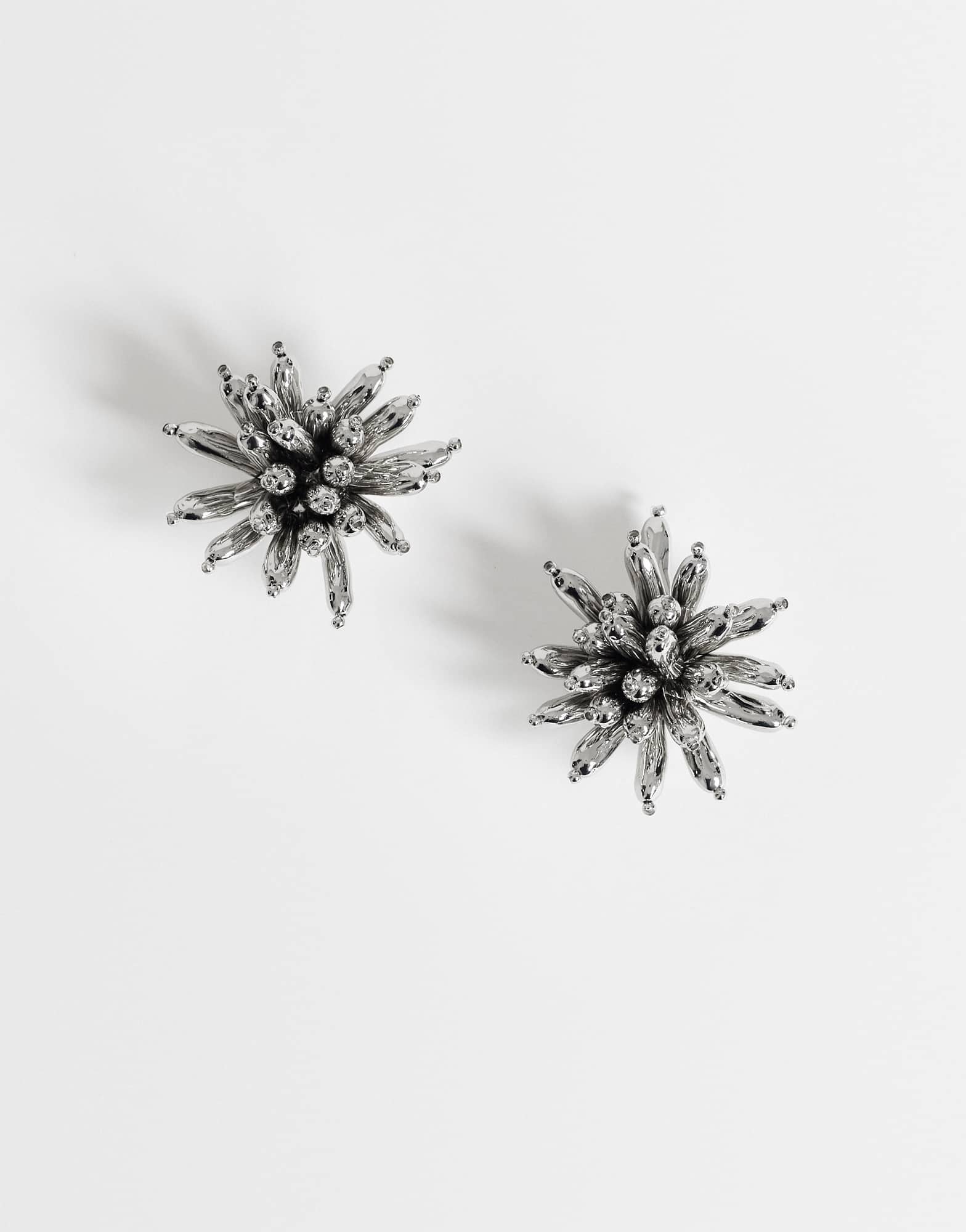 Topshop Cara statement flower earrings in silver