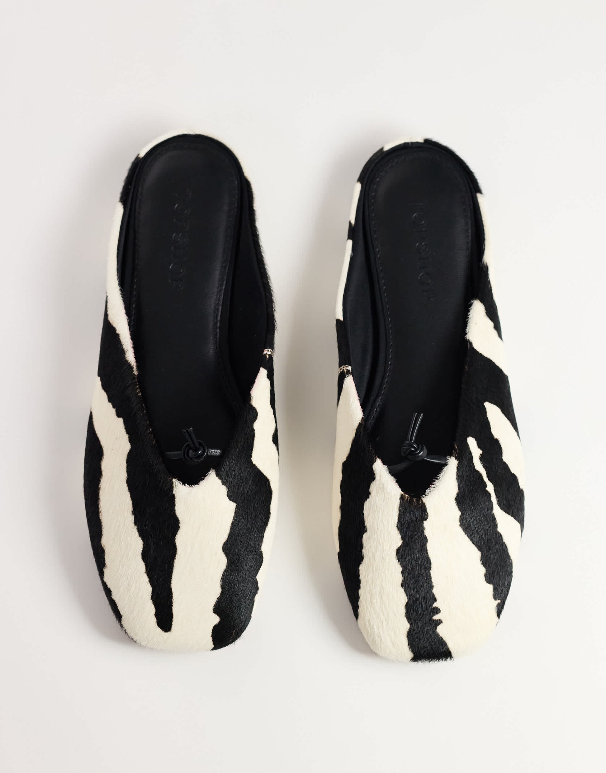 Topshop Blythe knotted flat mule in zebra print hair on real leather