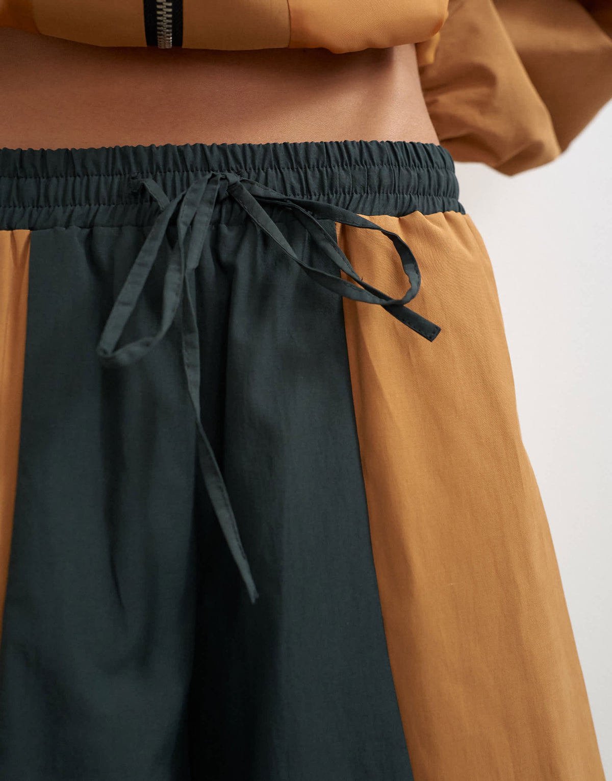 Topshop colour block horseshoe trouser in brown and black
