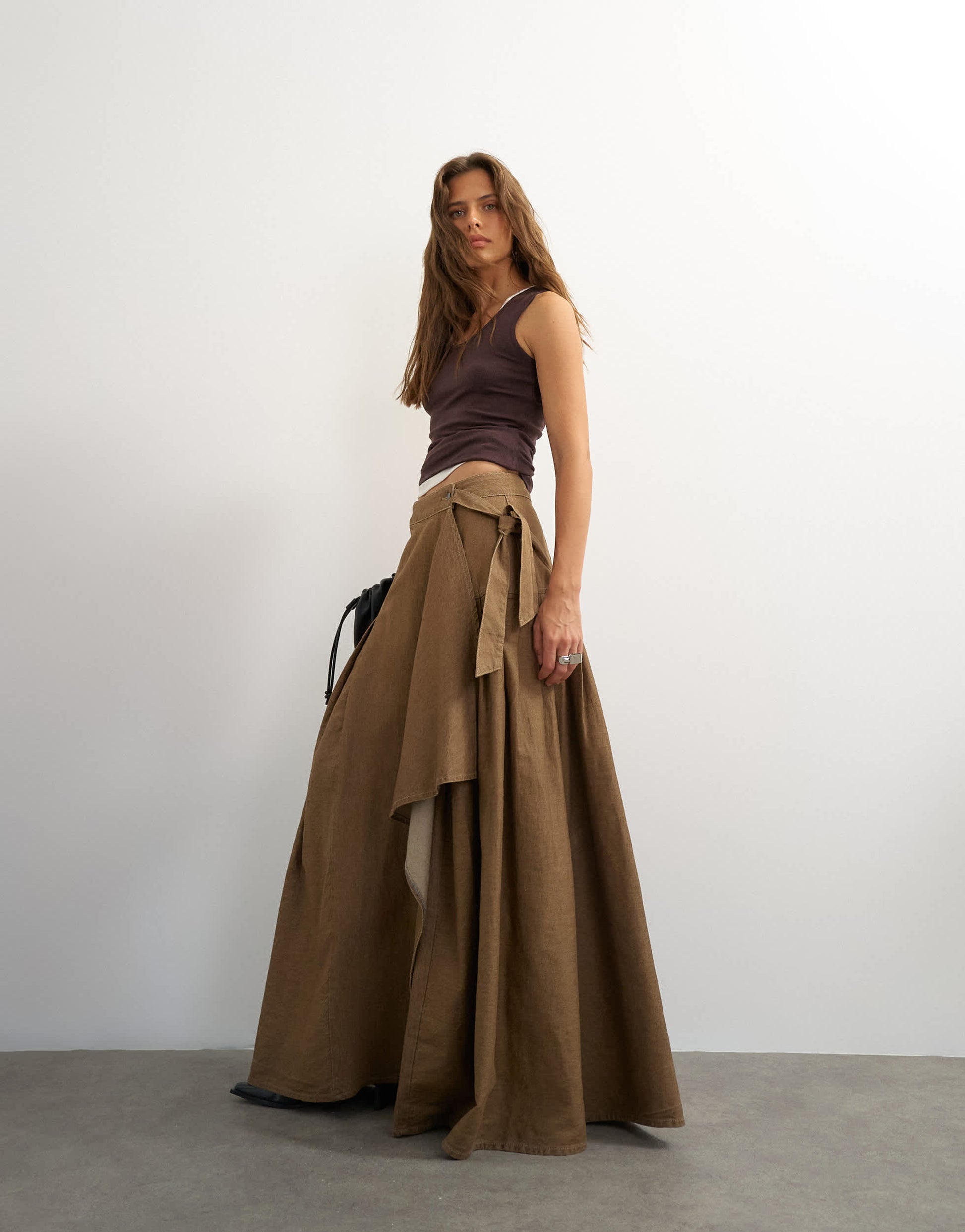 Topshop X Cara denim waterfall drape pleated skirt in camel