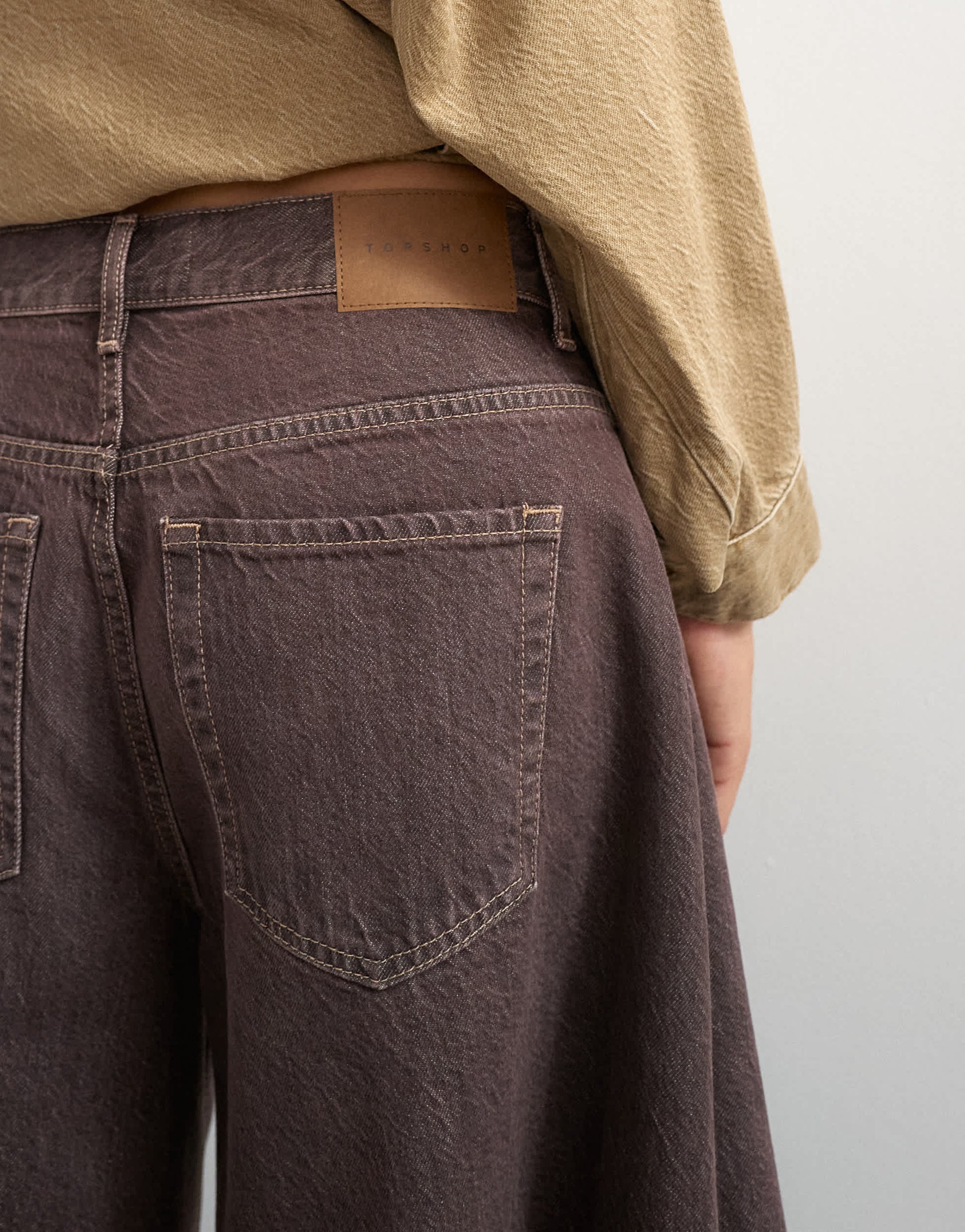 Topshop X Cara denim ultra-wide pleated culotte in taupe