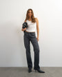 Topshop X Cara mid rise slim straight jean in washed black
