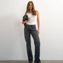 Topshop X Cara mid rise slim straight jean in washed black