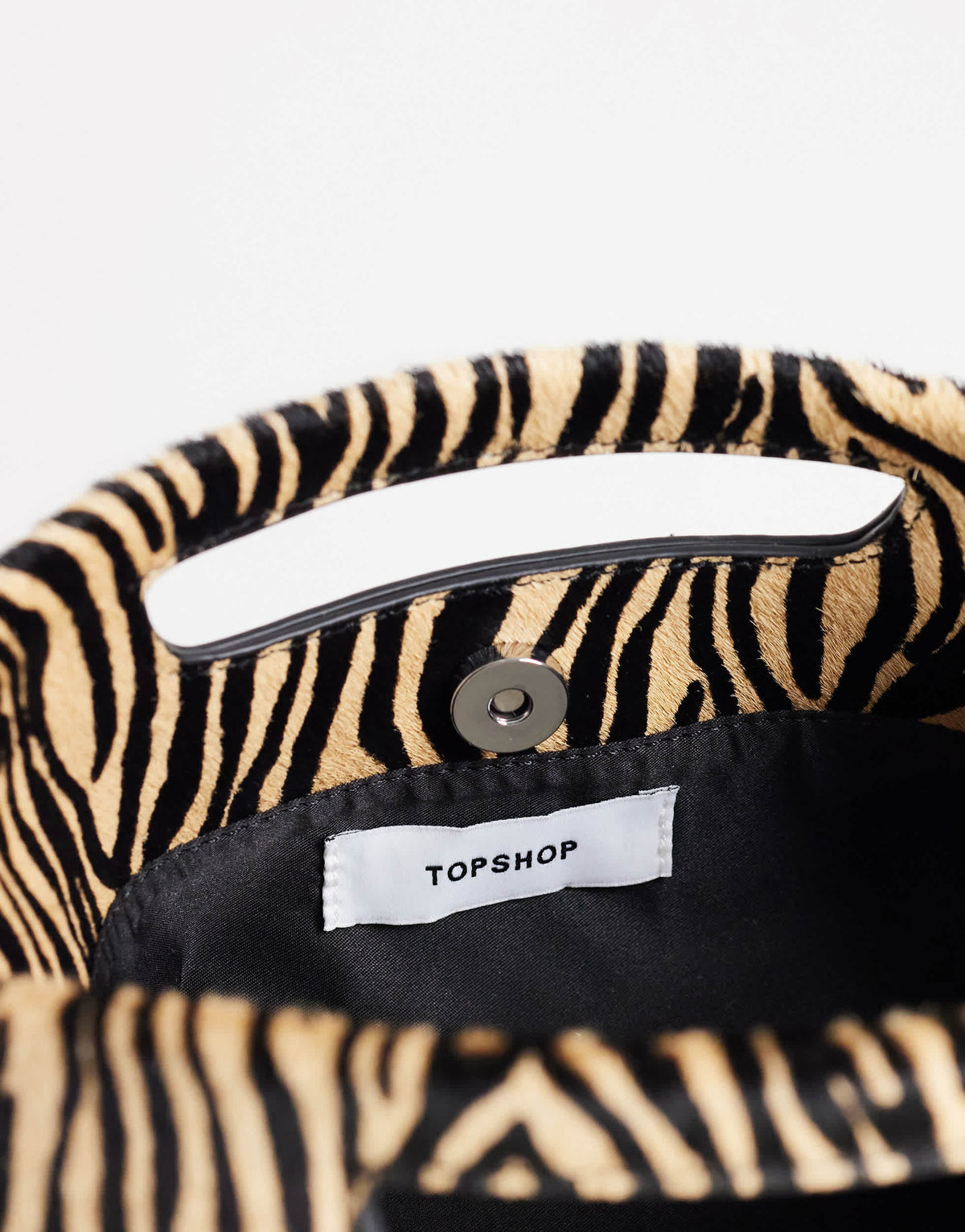 Topshop Daniel medium hair on real leather rectangle grab bag in camel zebra