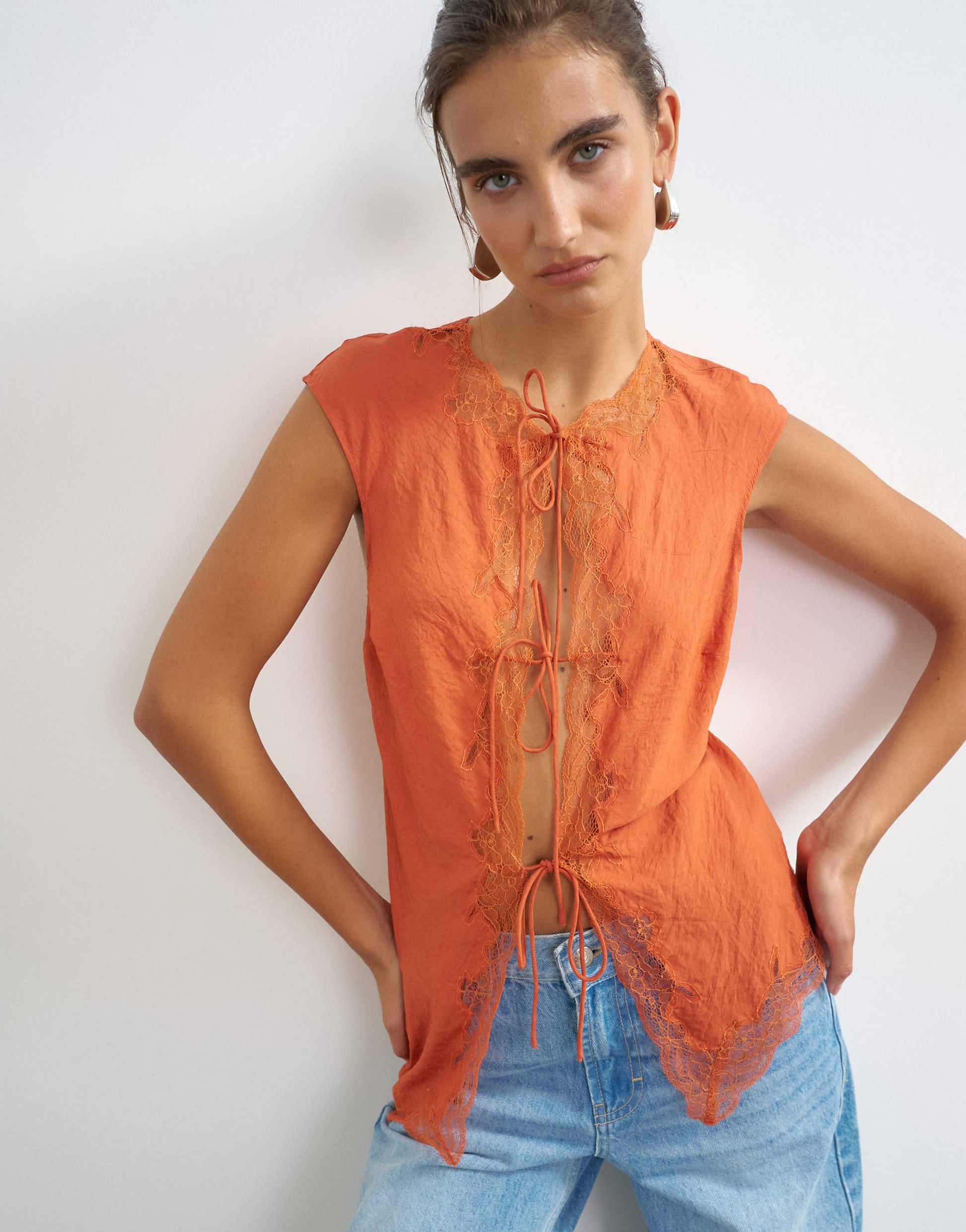 Topshop cap sleeve asymmetric tie front lace detail top in rust