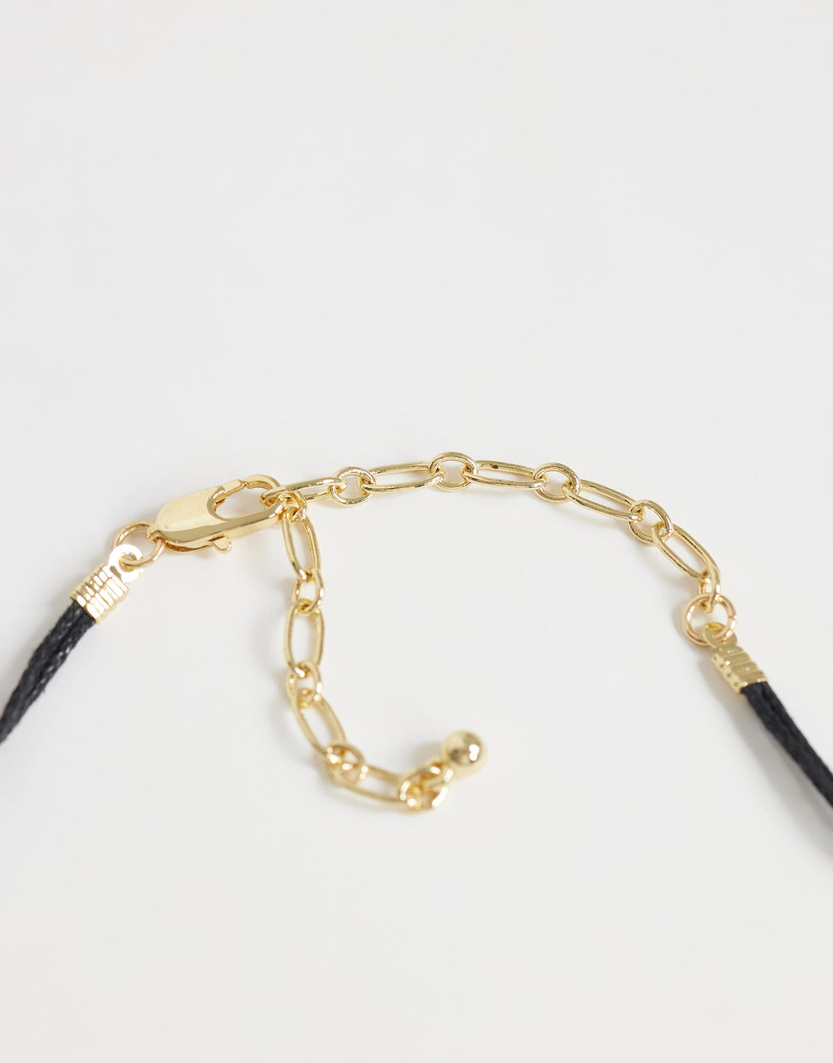 Topshop Nasha cord necklace in black with gold