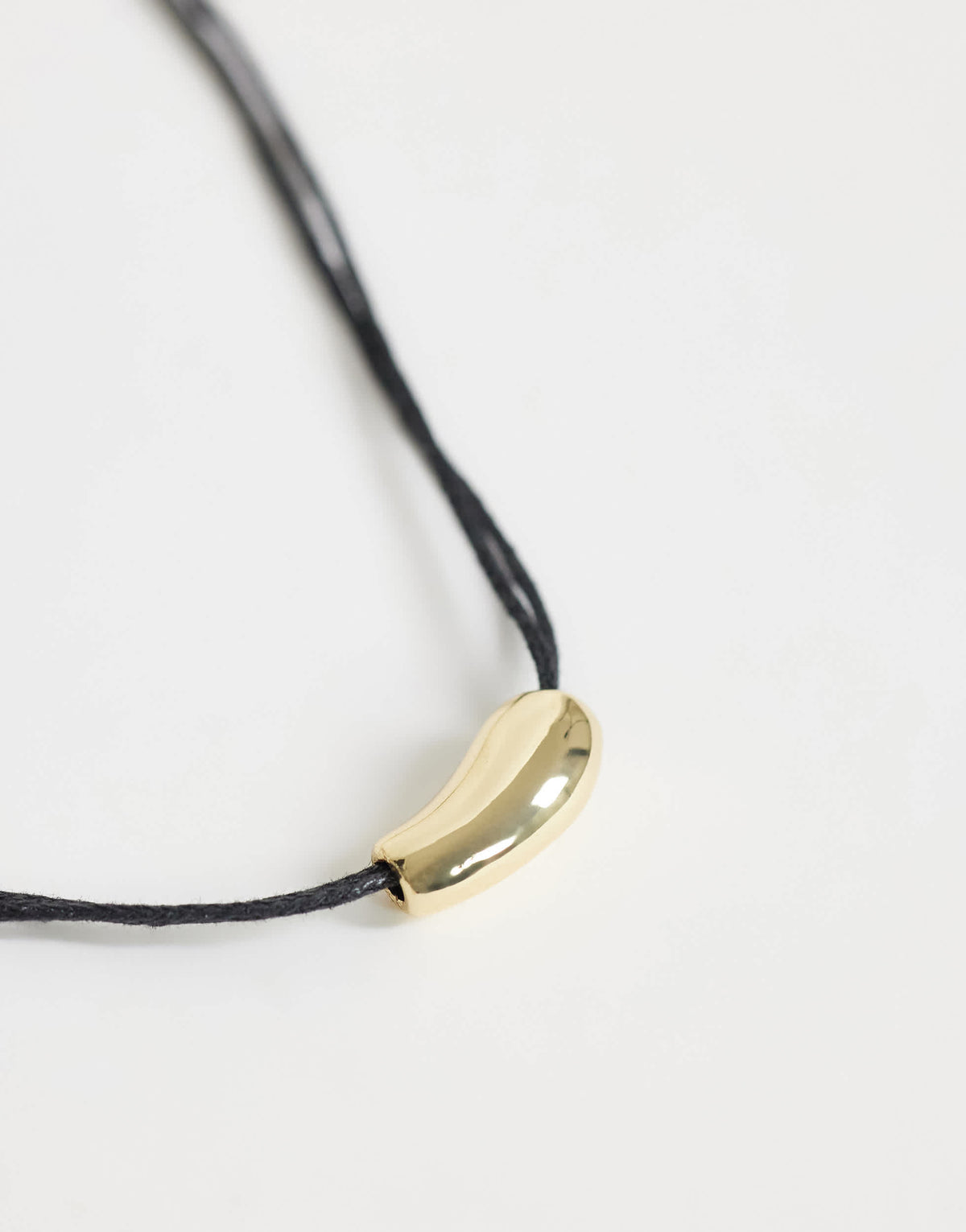 Topshop Nasha cord necklace in black with gold