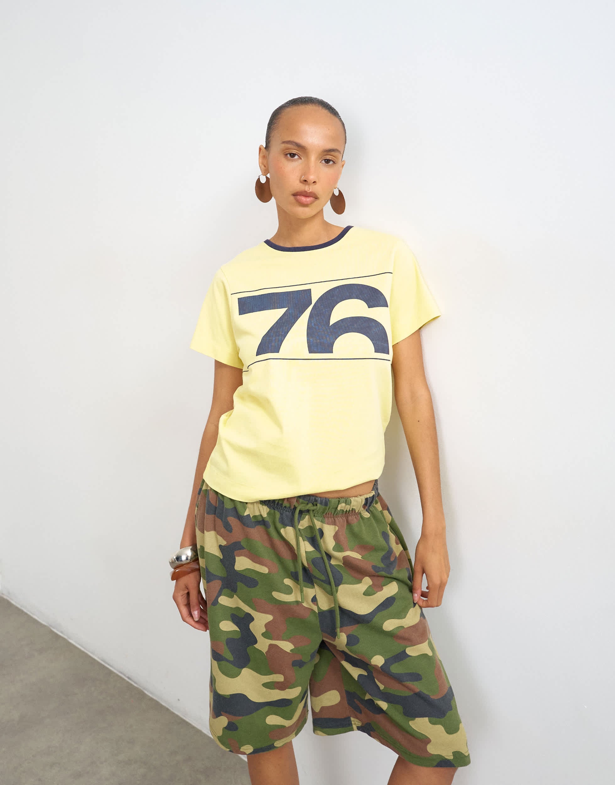 Topshop '76' graphic baby tee in yellow