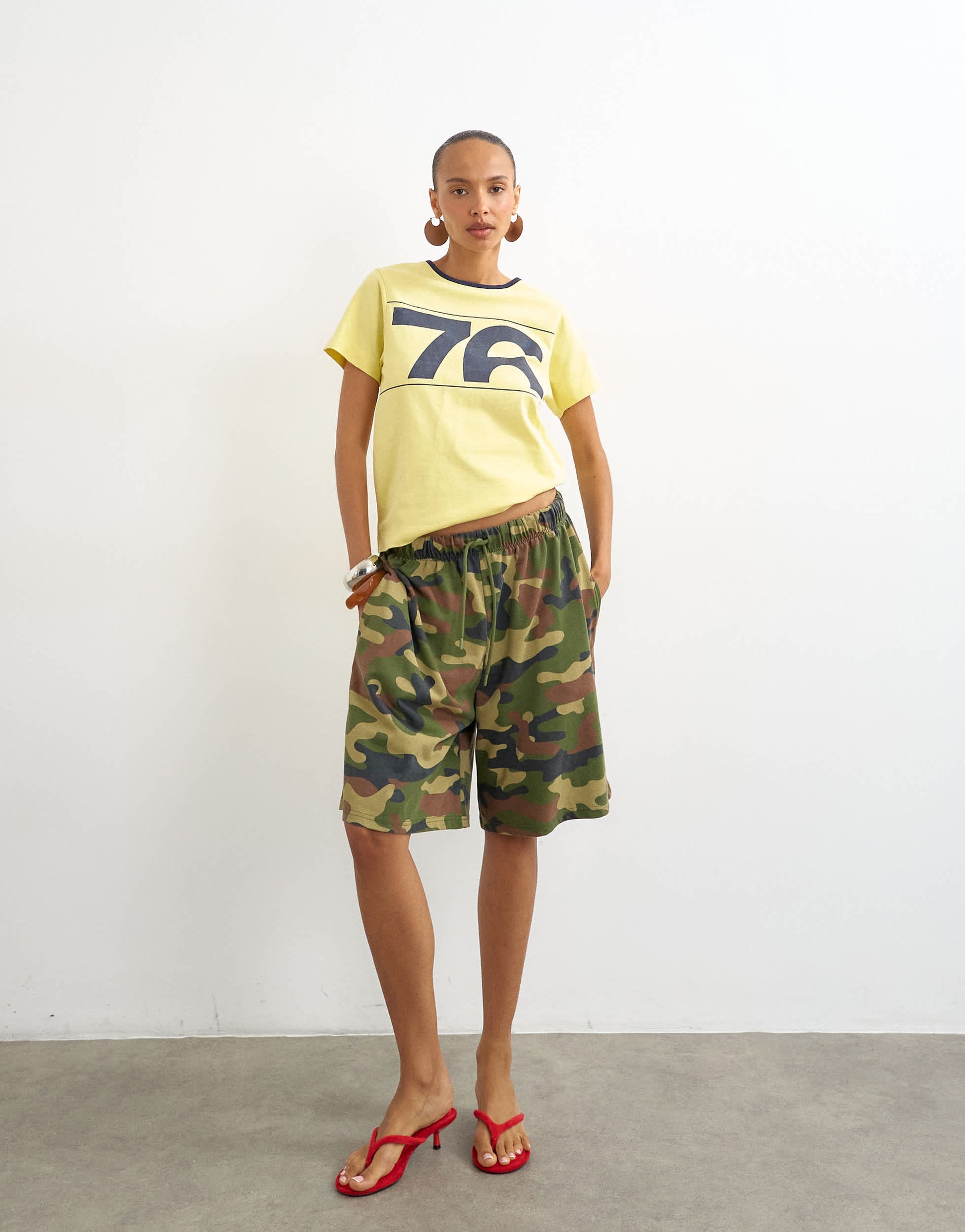 Topshop '76' graphic baby tee in yellow