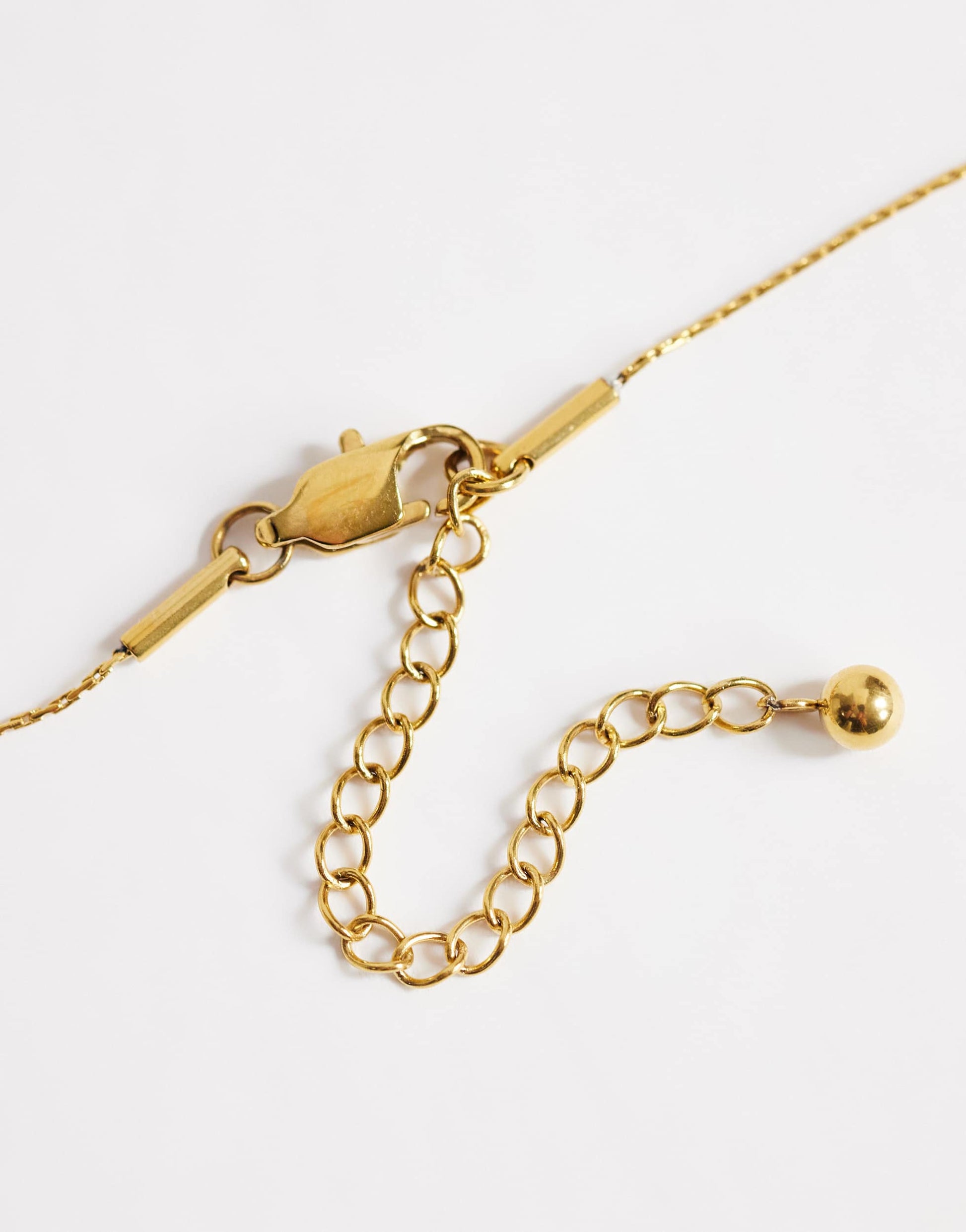 Topshop Olivio stainless steel necklace in gold with brown bead