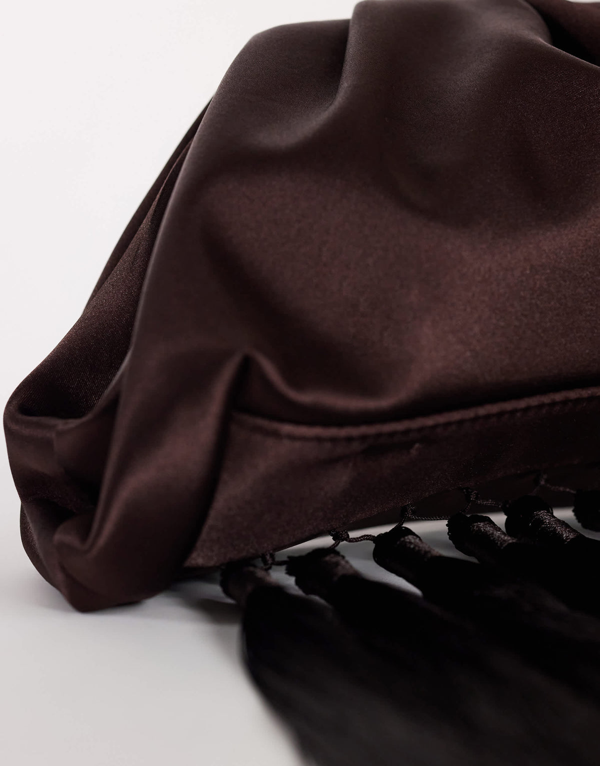 Topshop Evie knot tassel clutch bag in chocolate satin