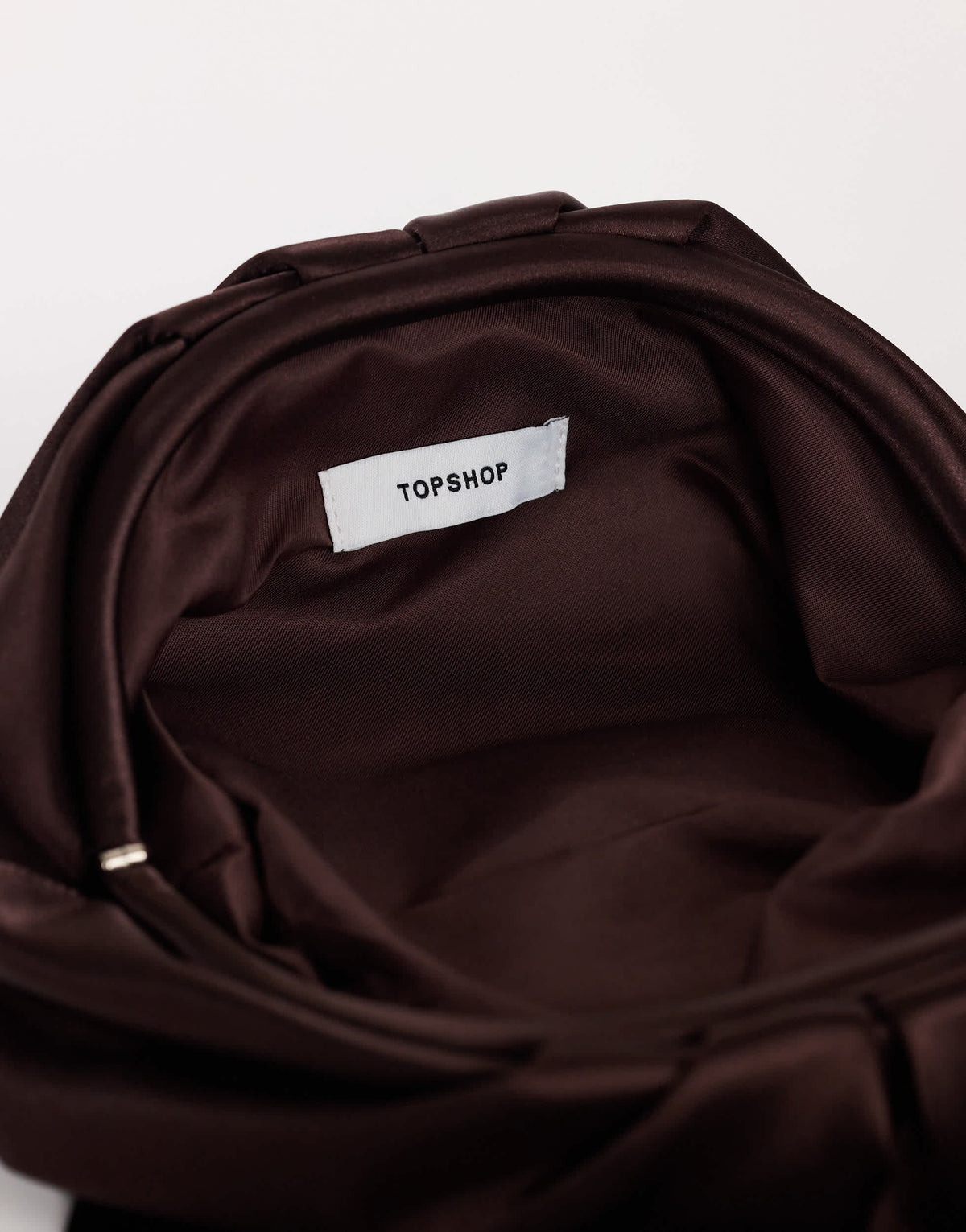 Topshop Evie knot tassel clutch bag in chocolate satin