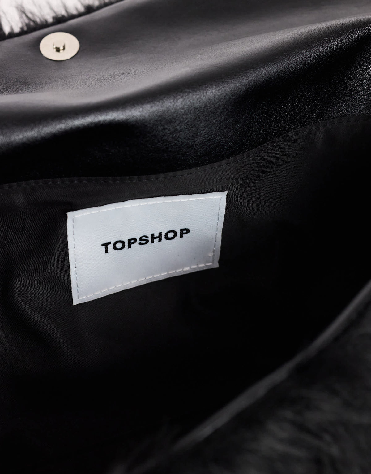 Topshop Ciara oversized folded faux fur structured clutch bag in black